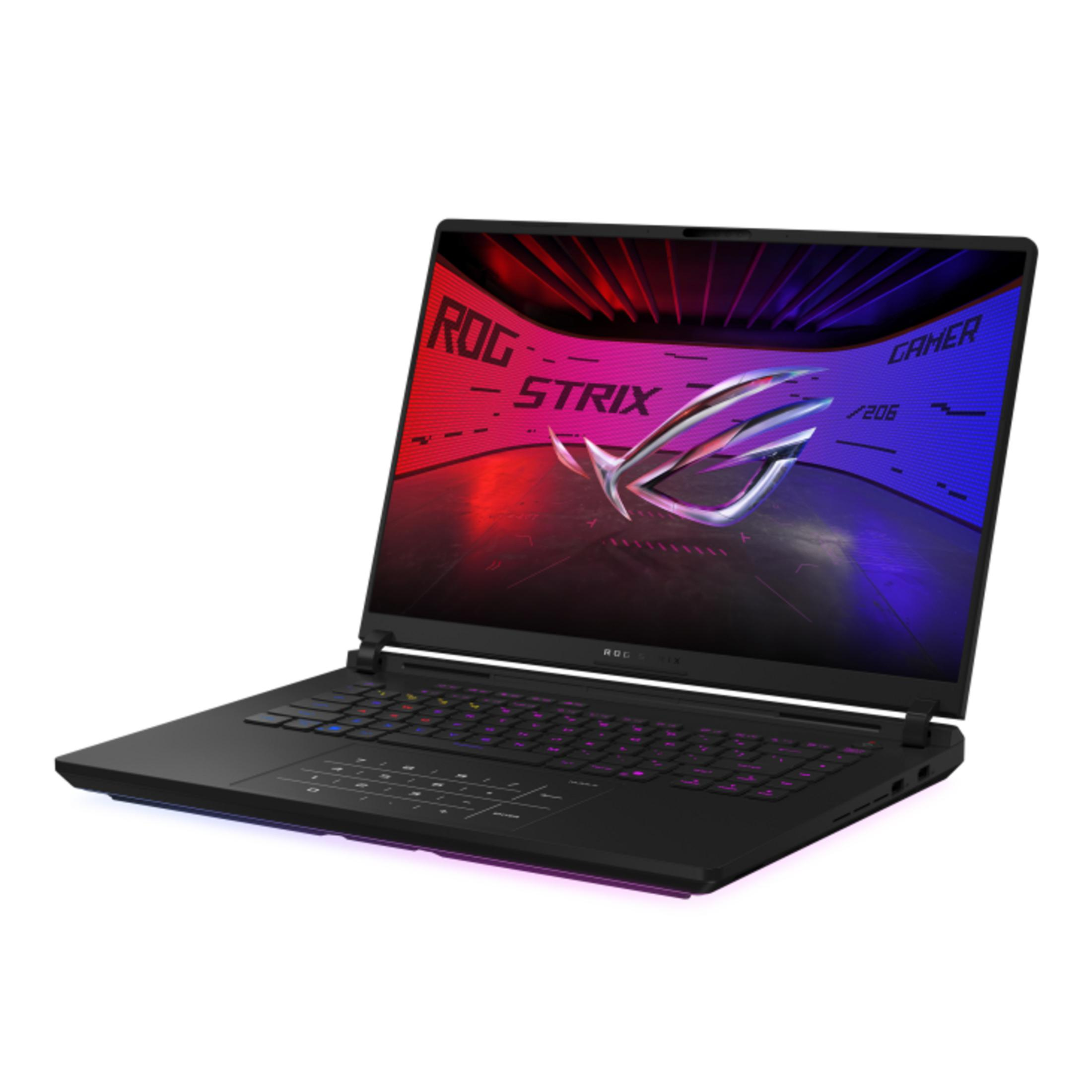 A black laptop with a lit keyboard and the ROG Strix logo displayed on its screen.
