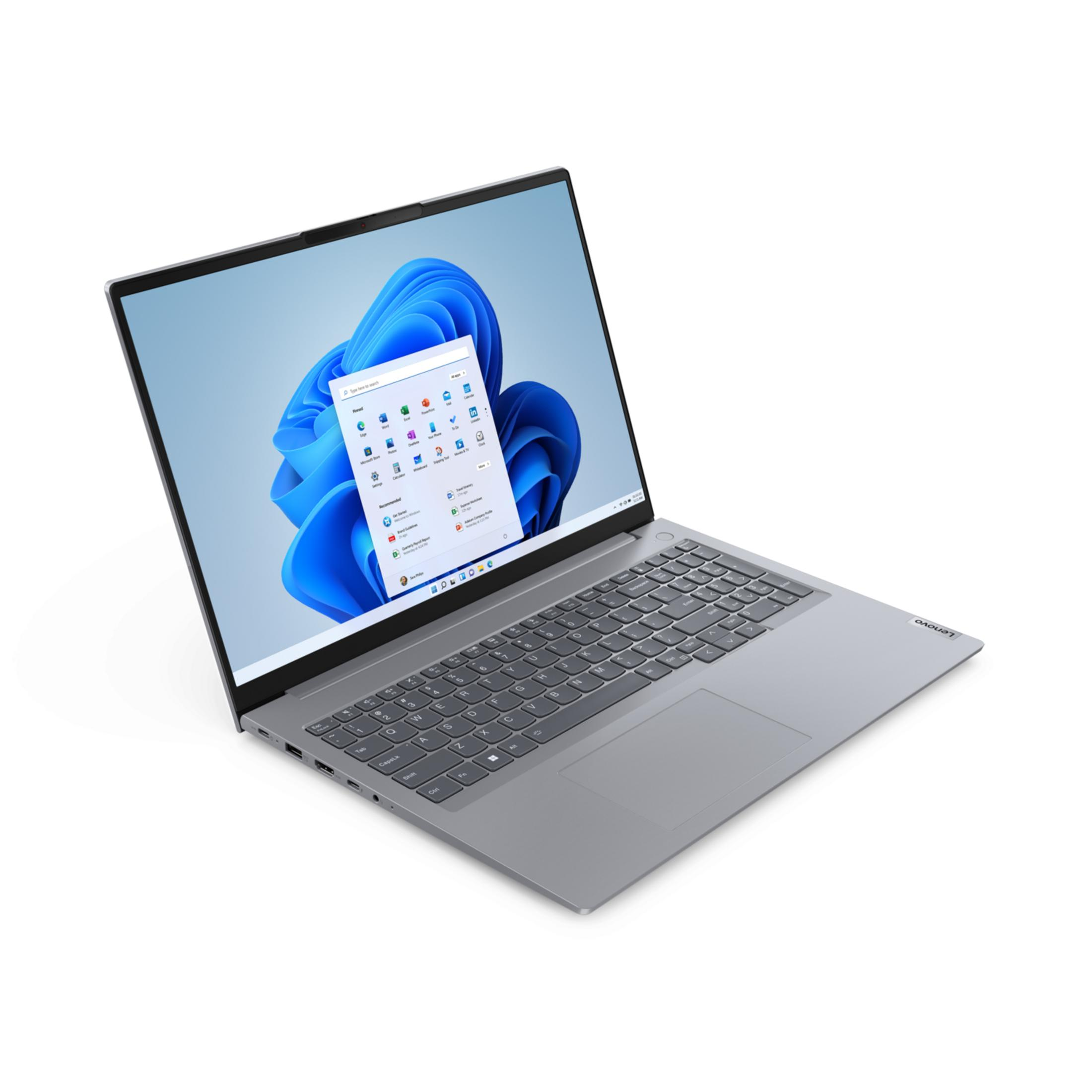 Szary laptop z otwartym ekranem, wyświetlający system Windows 11.