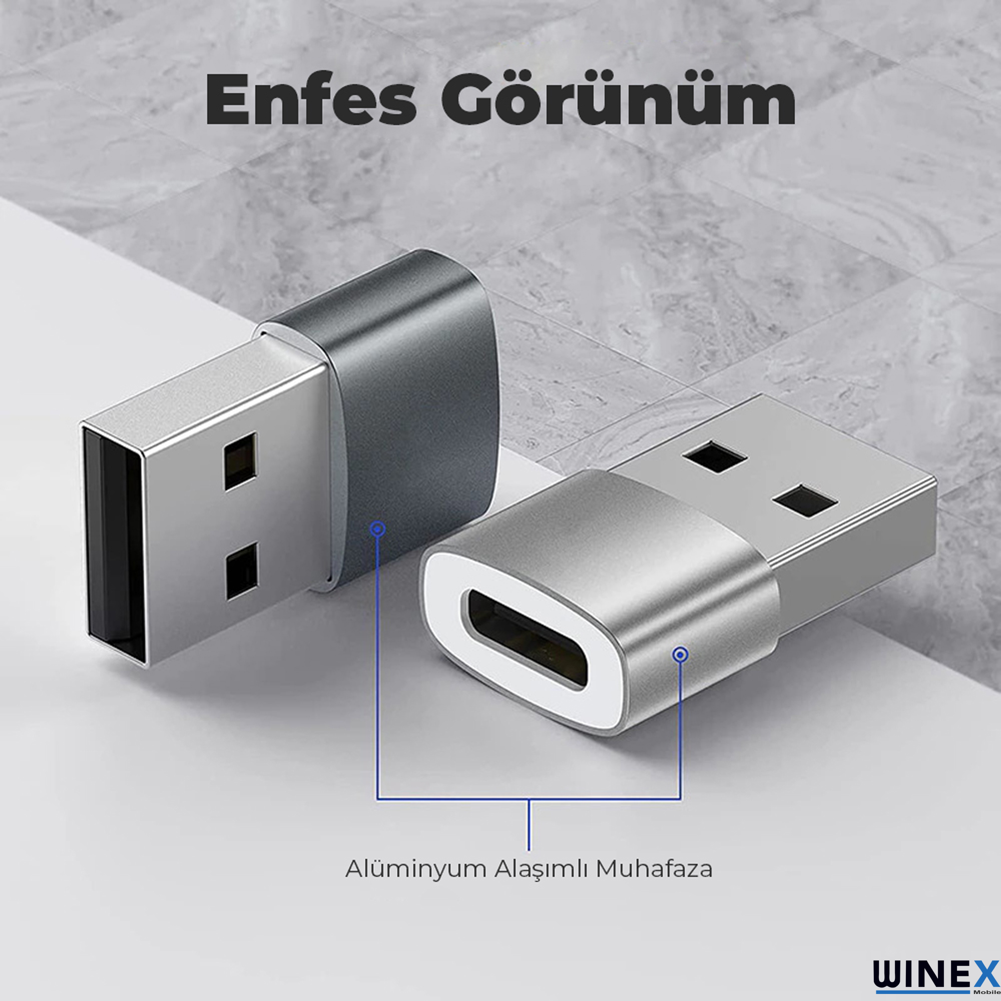 İki gümüş USB adaptörü yan yana gri arka planda.