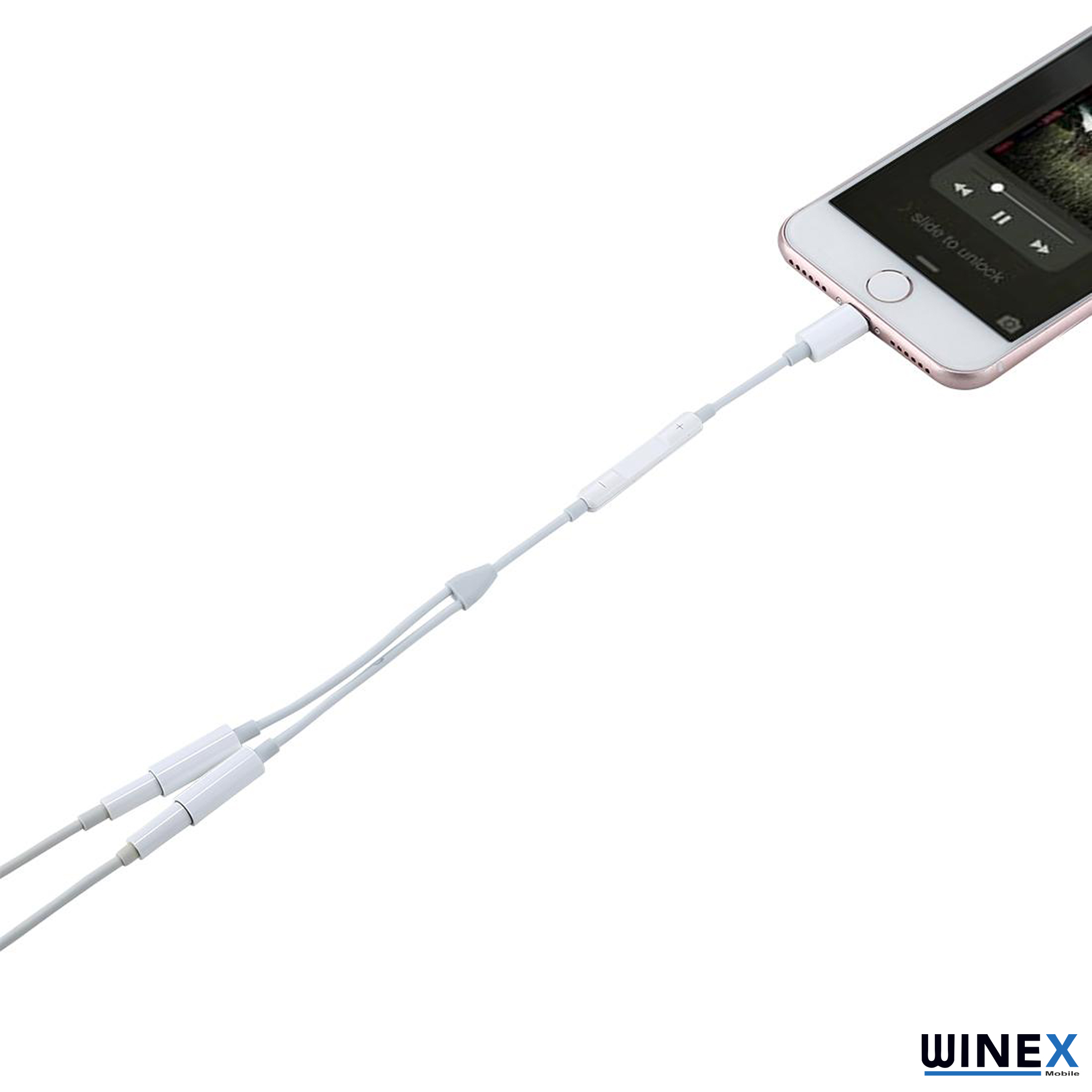 Beyaz bir adaptör, iPhone'a bağlı iki beyaz kabloya ayrılır.