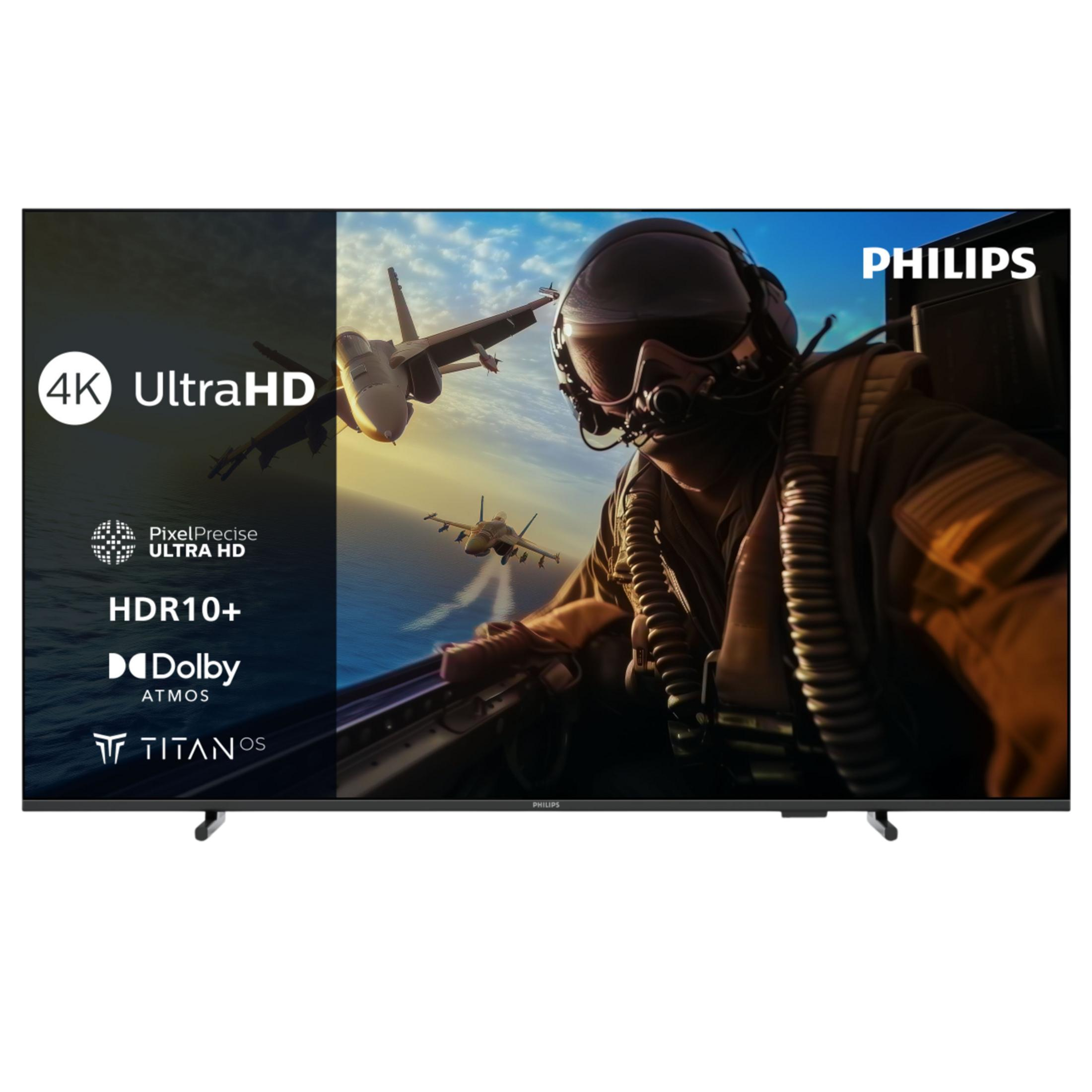 Telewizor Philips pokazuje myśliwce nad oceanem, pilot w kokpicie.