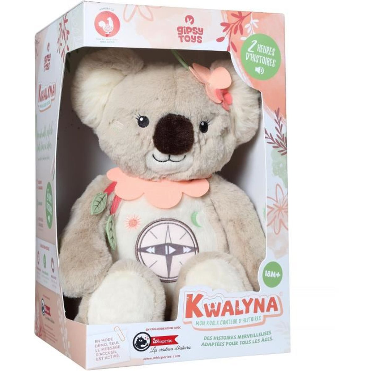 Ein plüschiger Koala Spielzeug in einer Box, mit einer Blume im Haar und einem Kompass-Design.