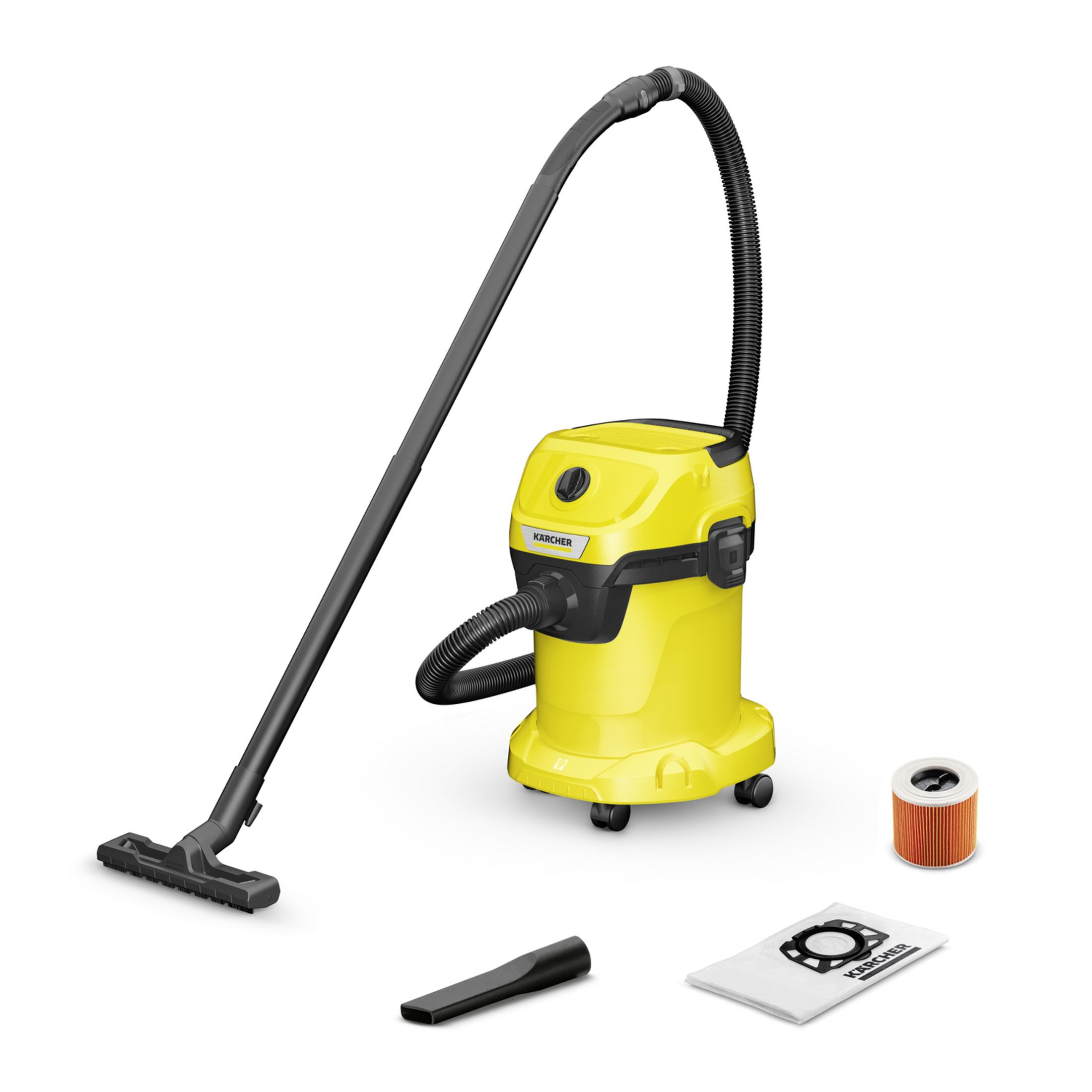 Żółty odkurzacz Karcher do pracy na mokro/sucho z wężem, rurą, dyszą podłogową, dyszą szczelinową, filtrem i workiem.