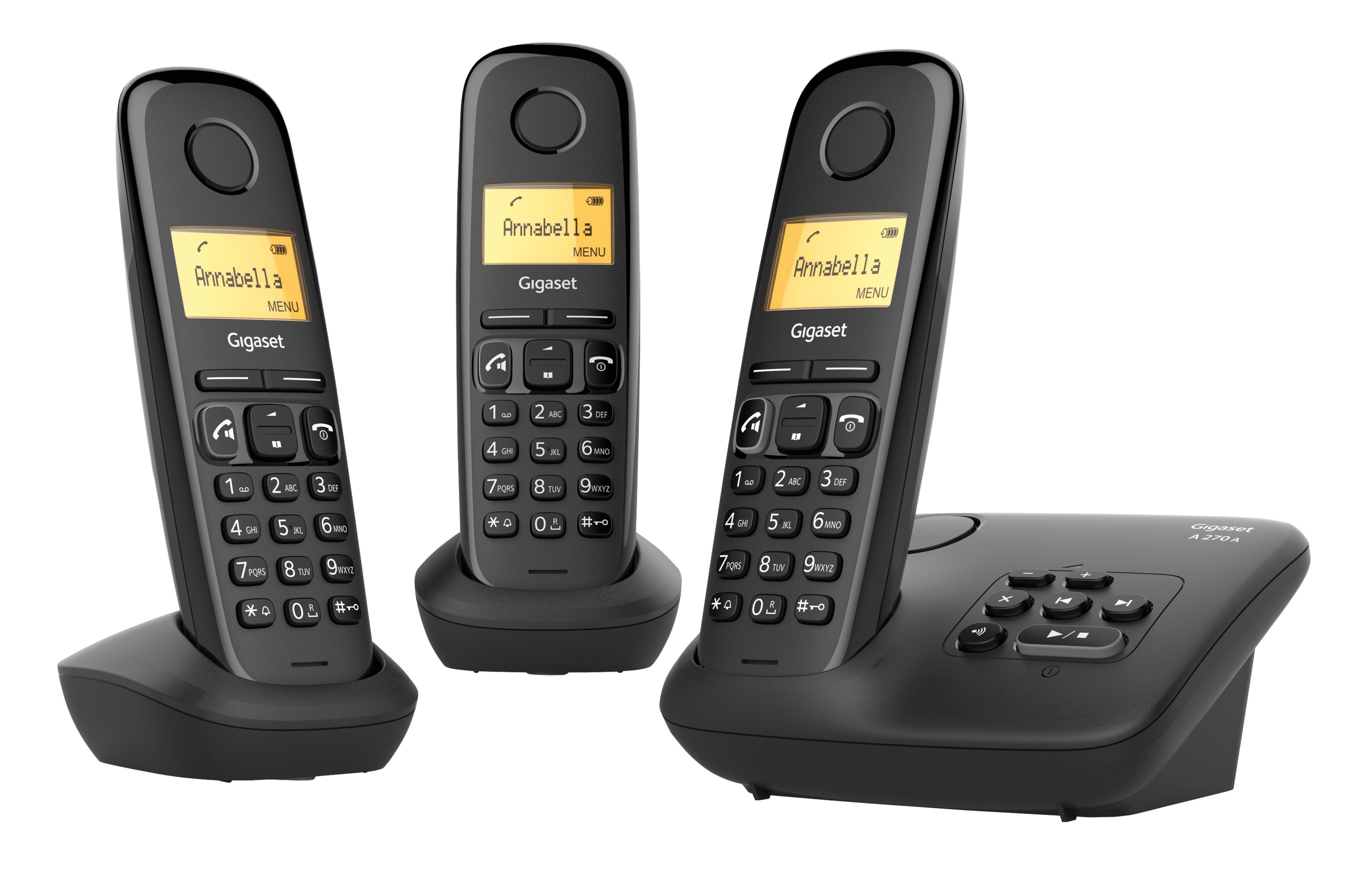 Drie zwarte Gigaset-telefoons, één op een basisstation, twee ernaast.