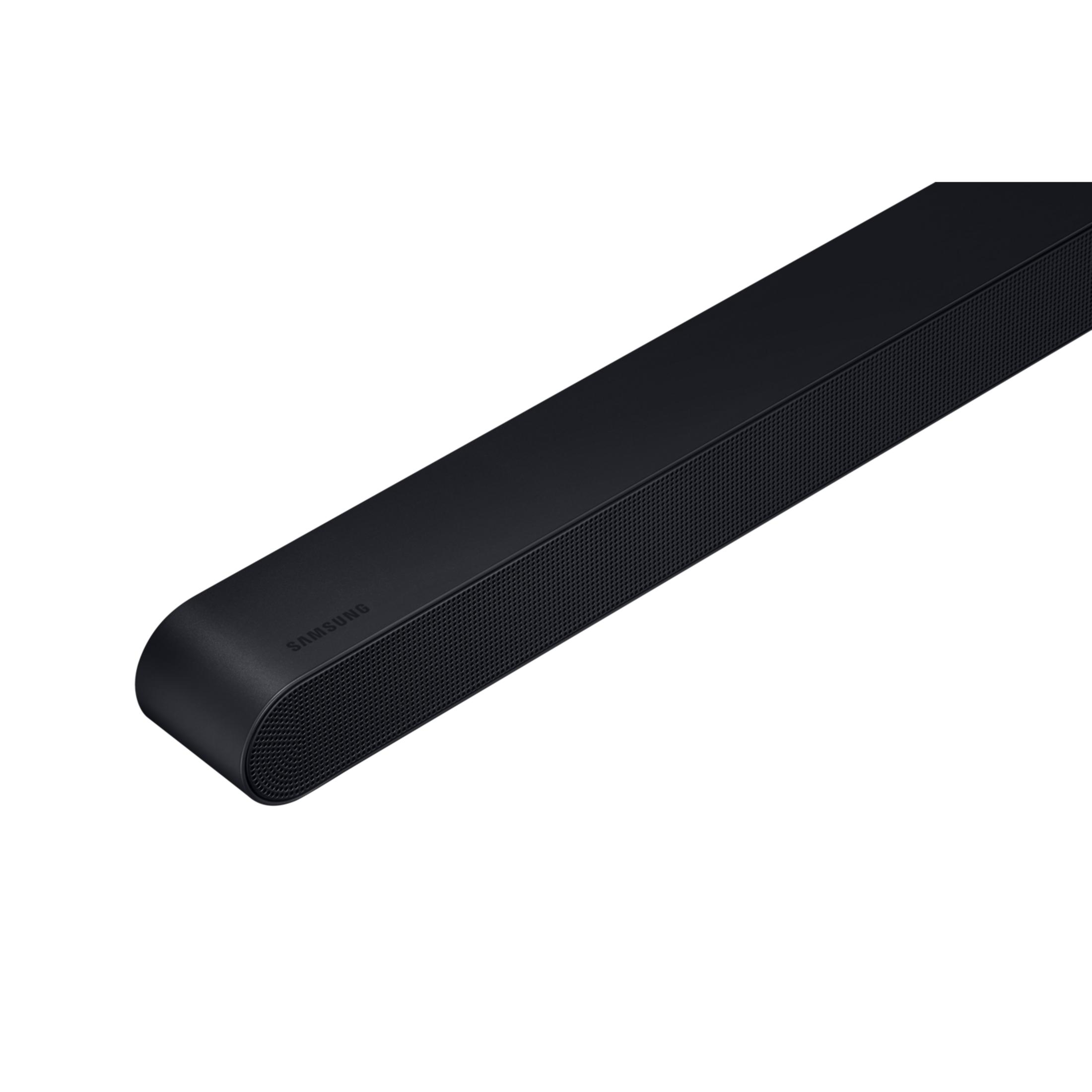 Barre de son Samsung noire avec grille de haut-parleur et logo discret.