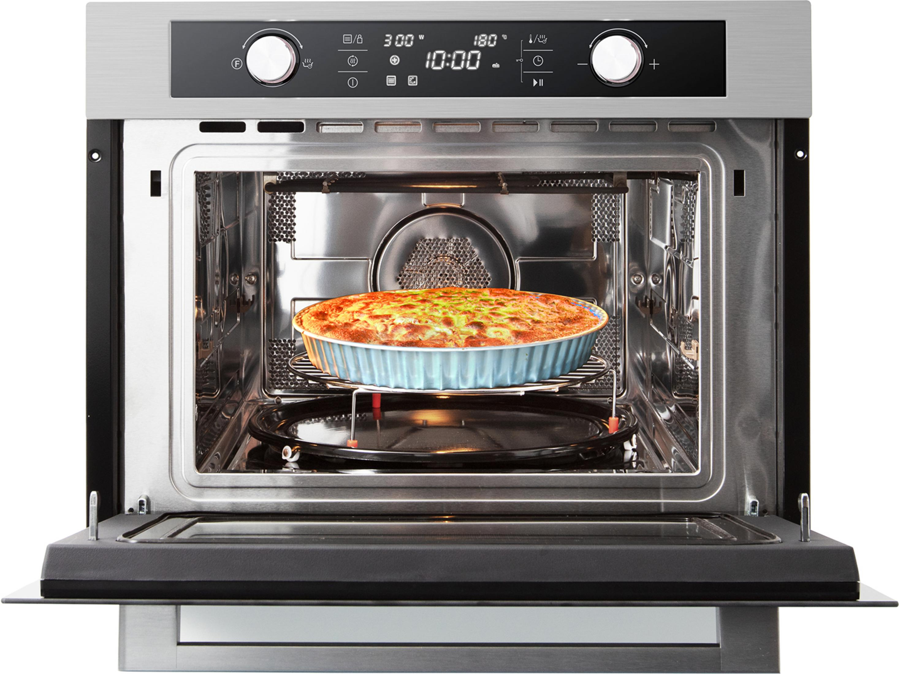 An open microwave with a loaf of bread on a rack inside.