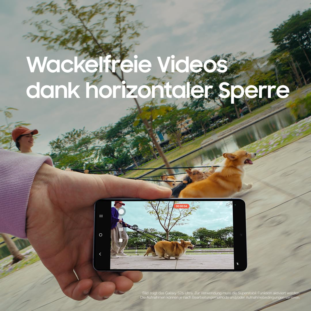 Hand hält Smartphone, das Hunde beim Spaziergang filmt. Text: Wackelfreie Videos.