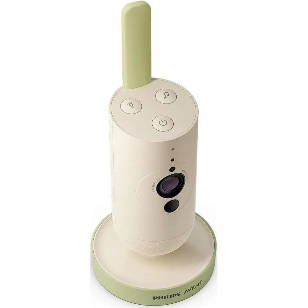 Ein weißer Baby Monitor mit grünem Antennenaufsatz und Sockel.