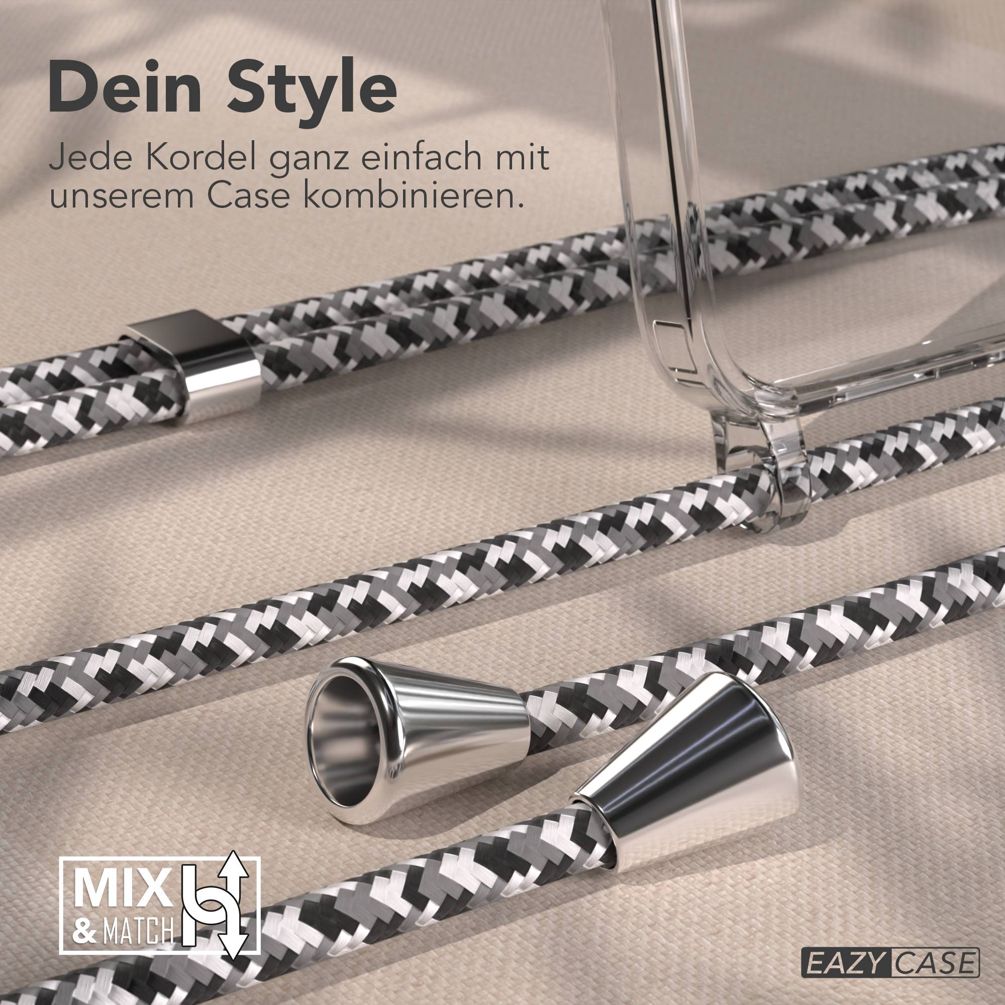 Ein transparentes Handyhülle liegt neben gemusterten Schnüren mit Metallenden.