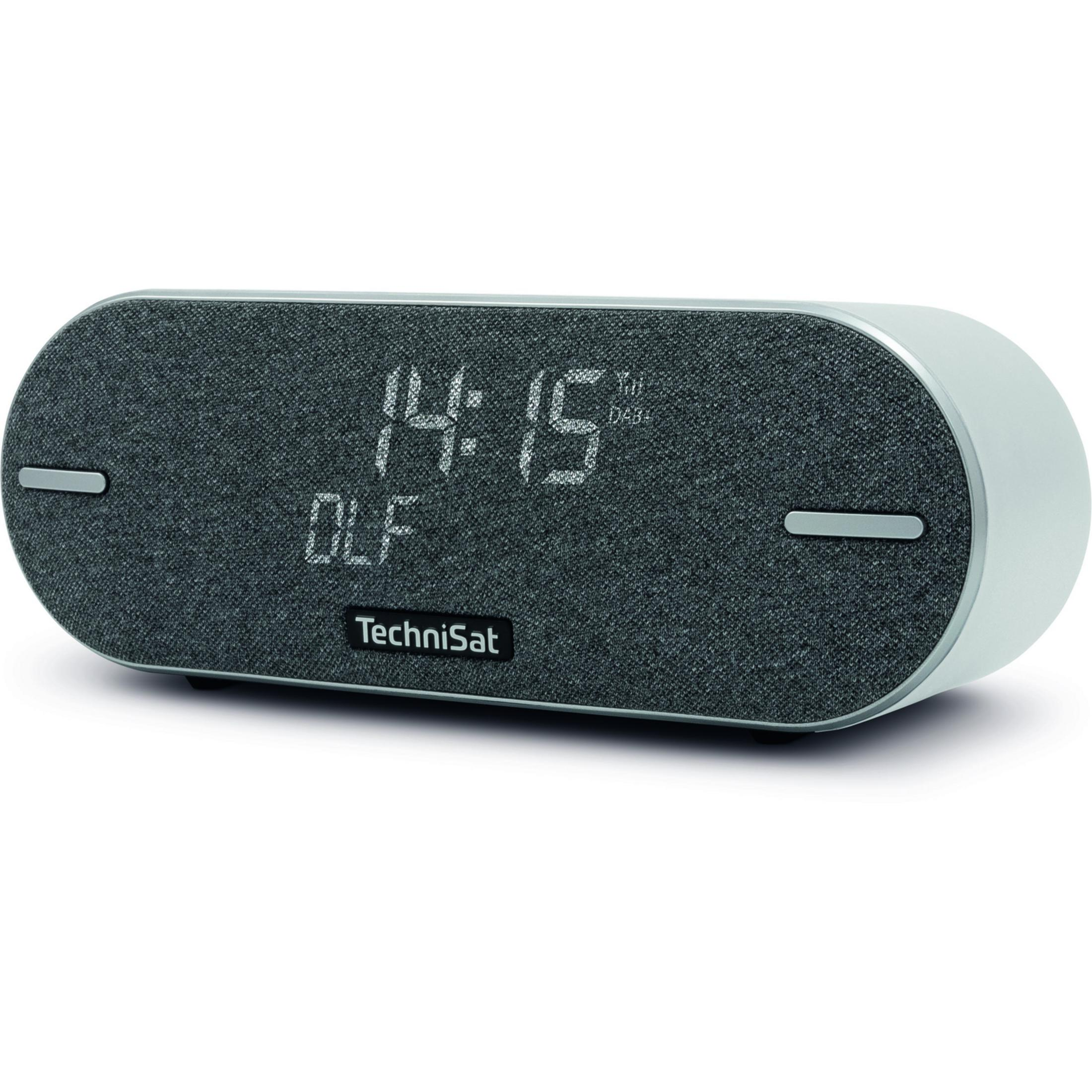 Grijze digitale radio wekker met zilveren accenten en een gloeiende tijdsweergave.