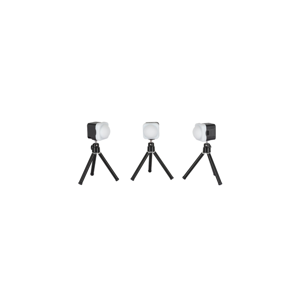 Three small white cube lights on black mini tripods, spaced evenly.