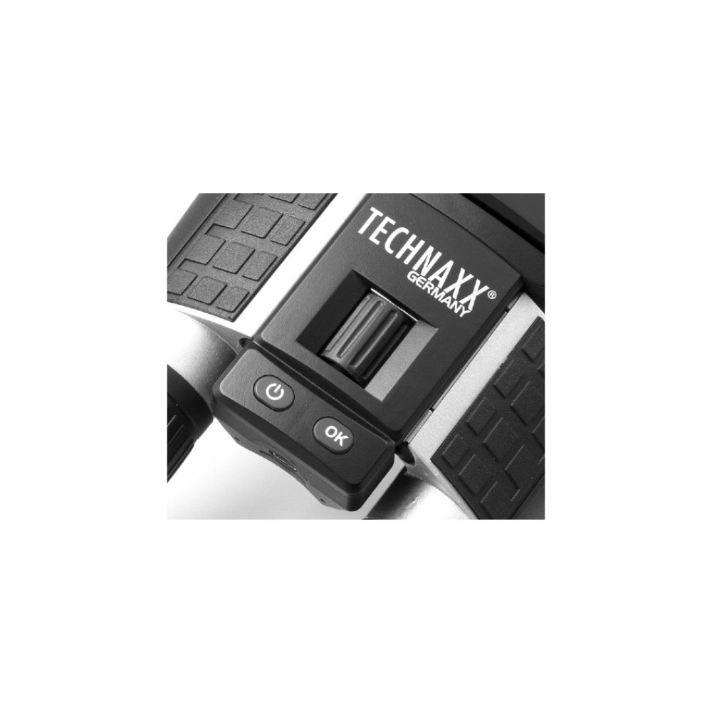Primer plano de un dial negro con "TECHNAXX GERMANY" y botón OK.