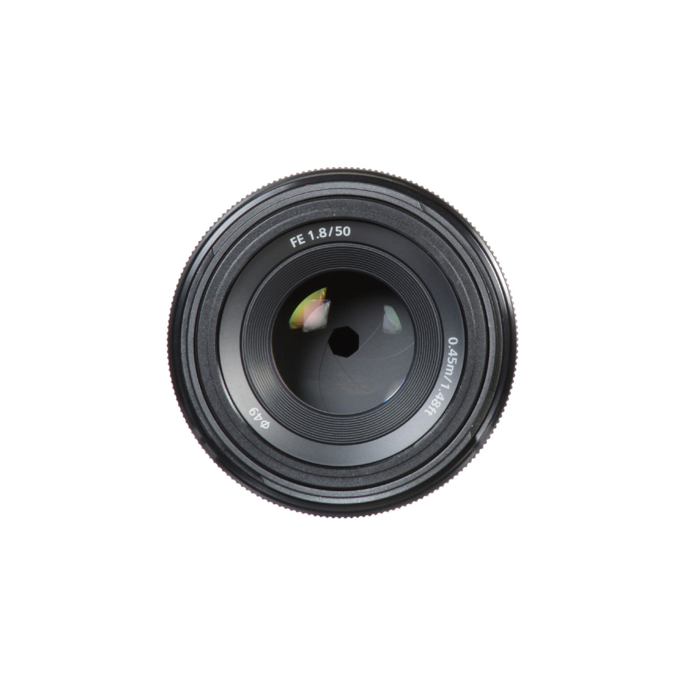 A camera lens with FE 1.8/50 markings and a 49mm filter thread.