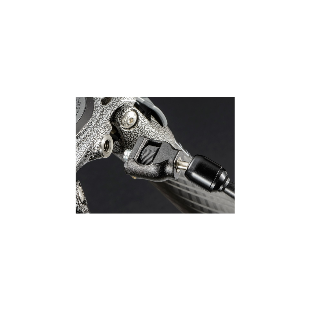 A black cable connector is attached to a gray metal part.