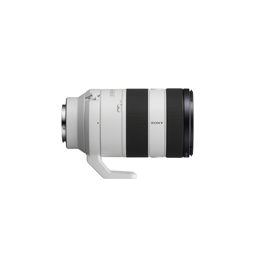A white Sony lens with black rings and a silver mount.