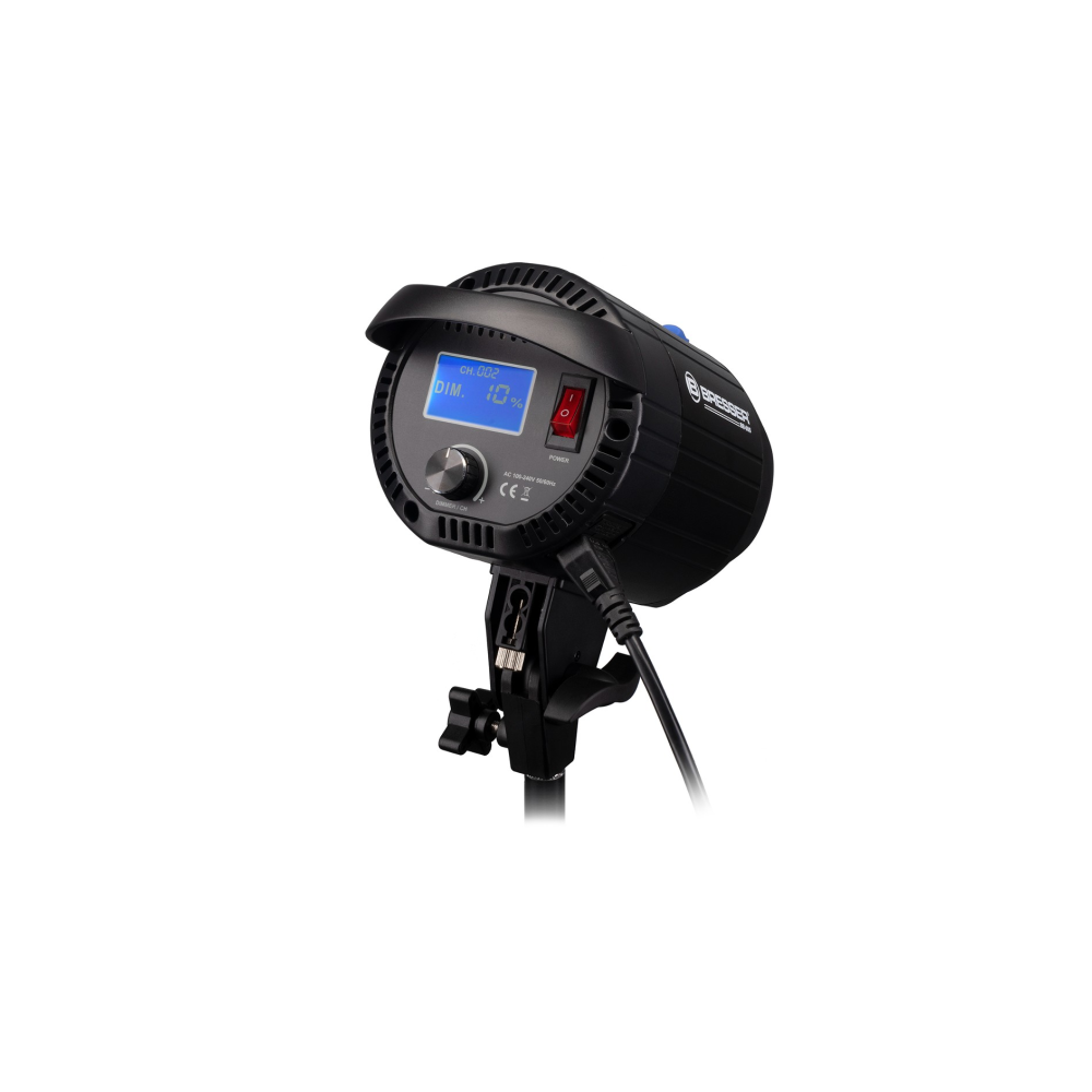 Zwarte studioflitser met LCD-scherm, dimknop en rode aan/uit-schakelaar.