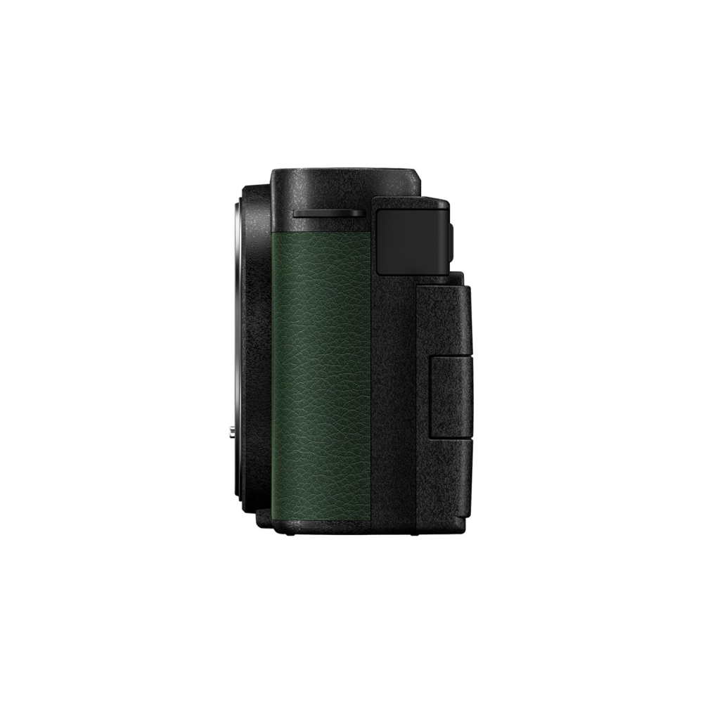A black camera with a dark green leather accent, viewed from the side.