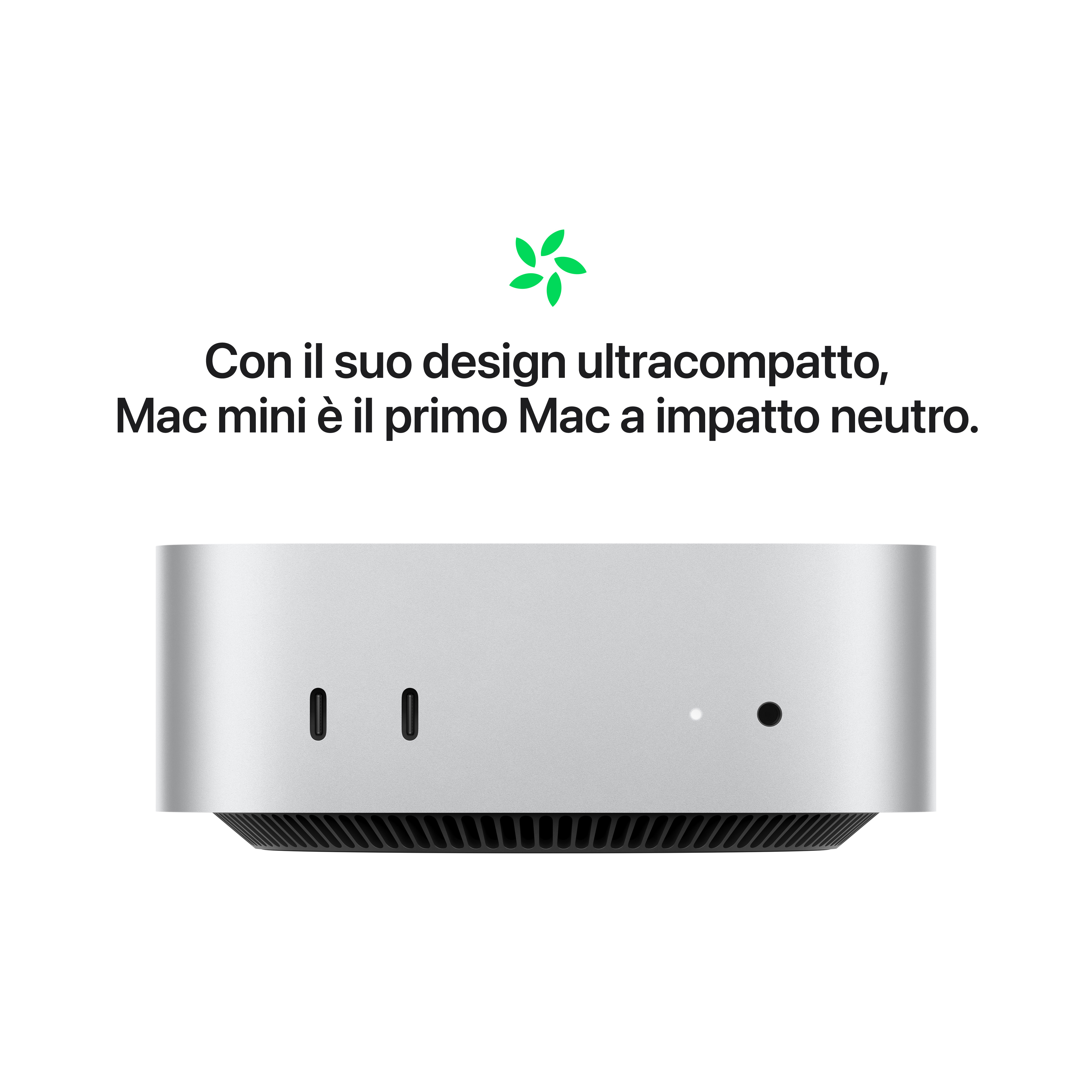 Mac mini argentato con due porte USB e un pulsante di accensione.