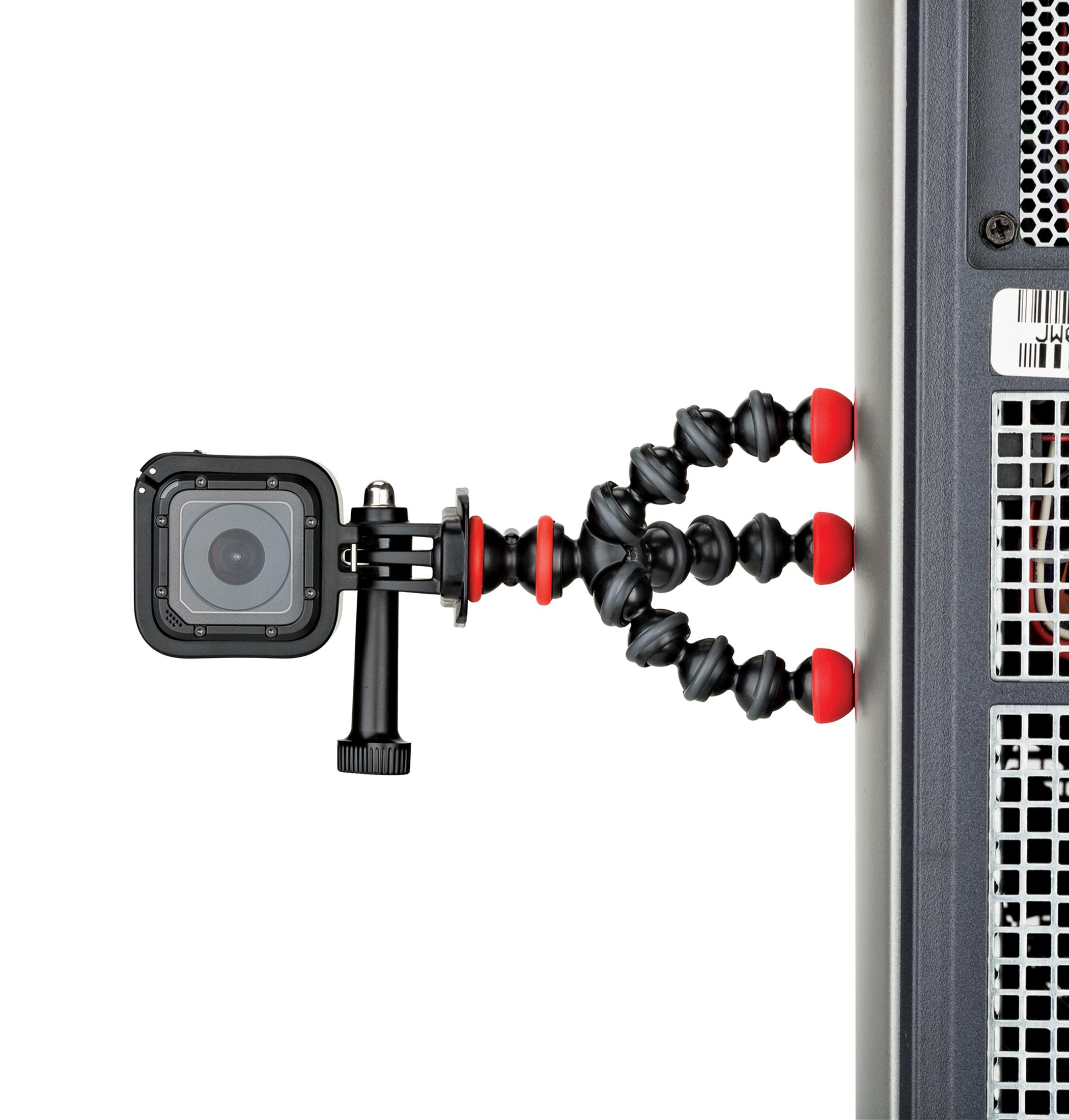 A GoPro camera is attached to a computer case with a flexible tripod.