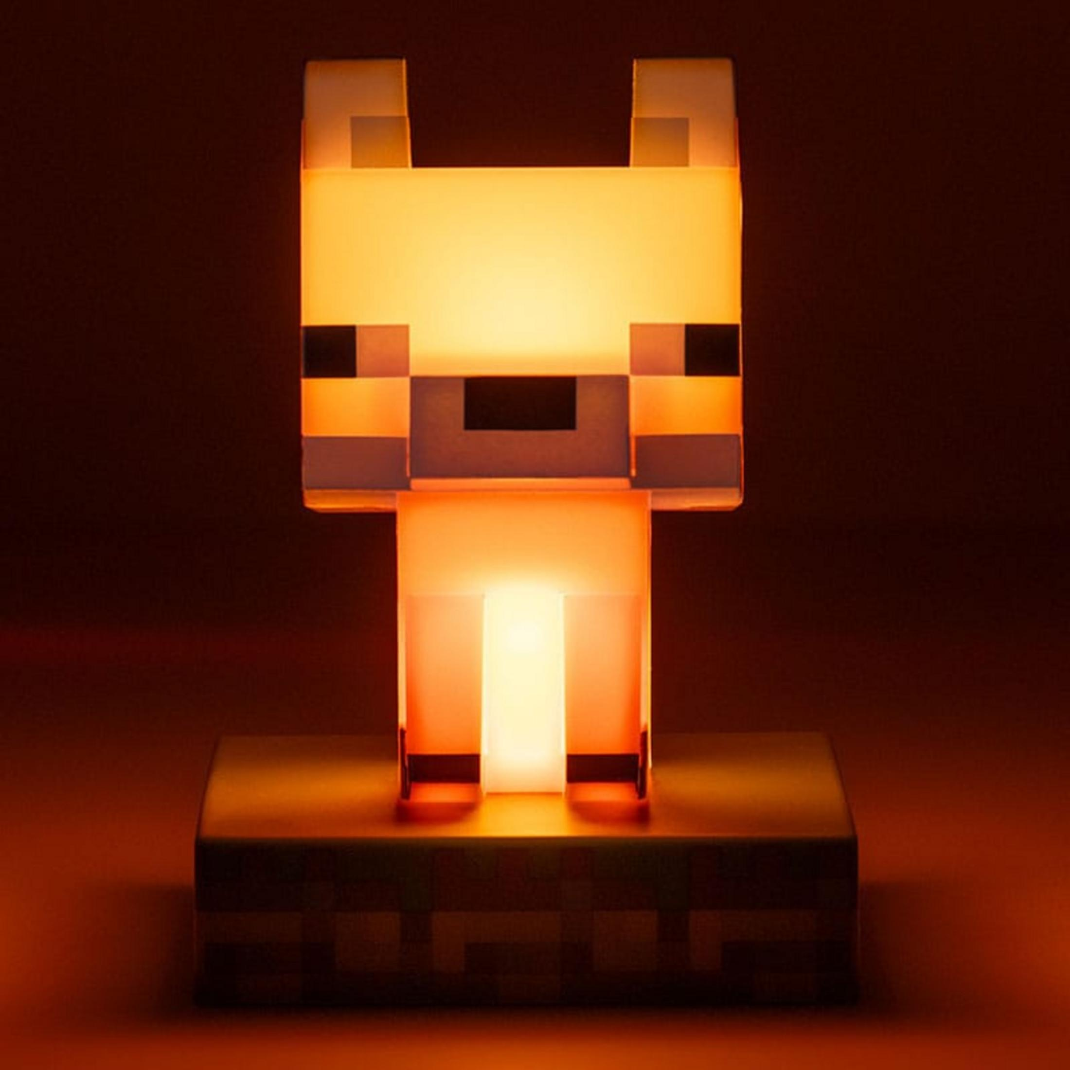 Ein leuchtendes Minecraft-Fuchs-Nachtlicht steht auf einem dunklen Sockel.