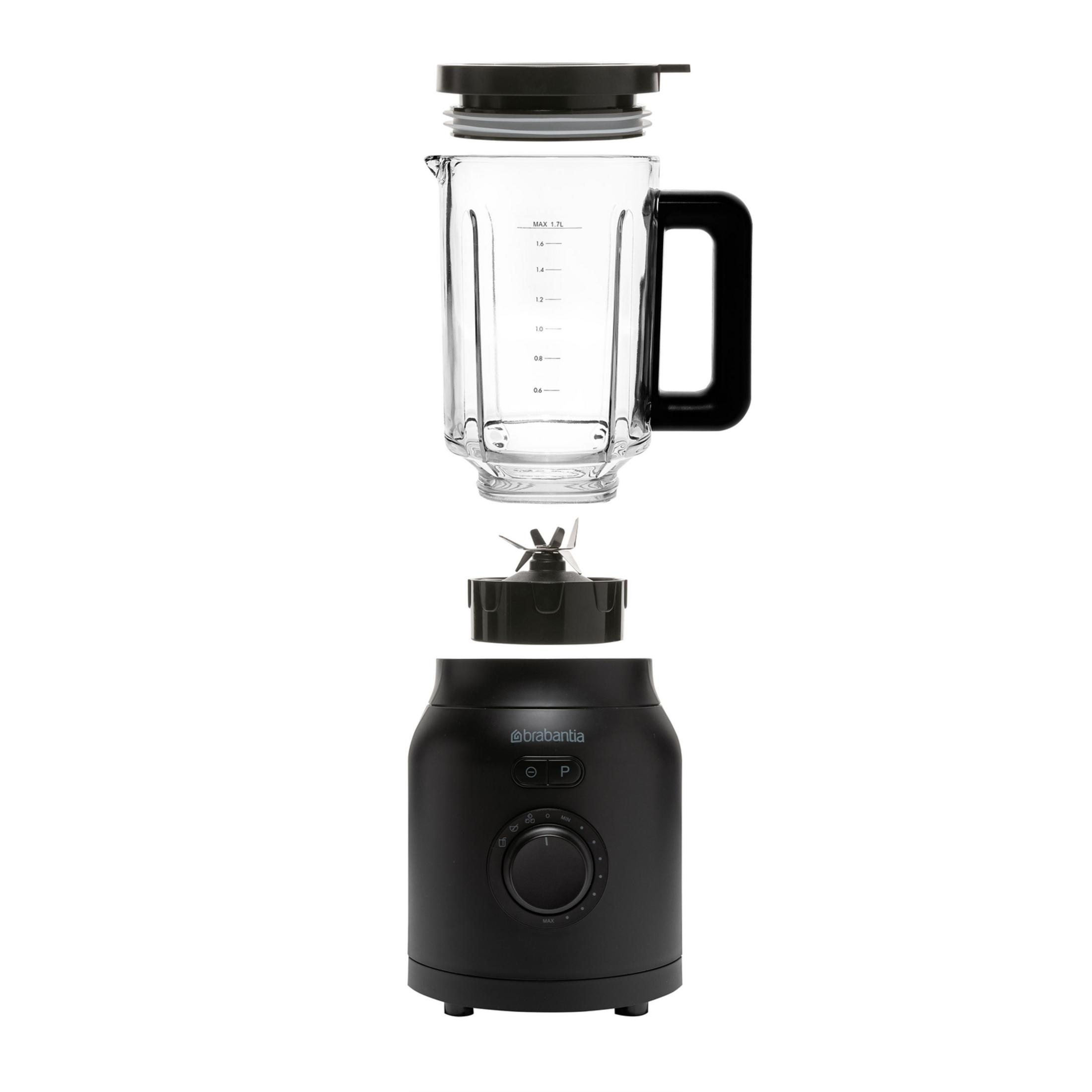 Black blender with glass jug, blades, and controls disassembled.