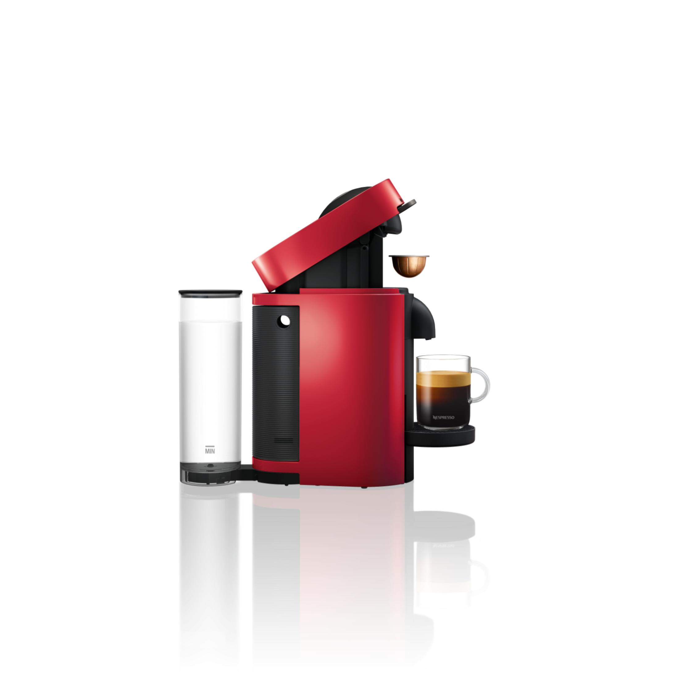 Rote Nespresso-Maschine mit Wassertank und einer Tasse Espresso.