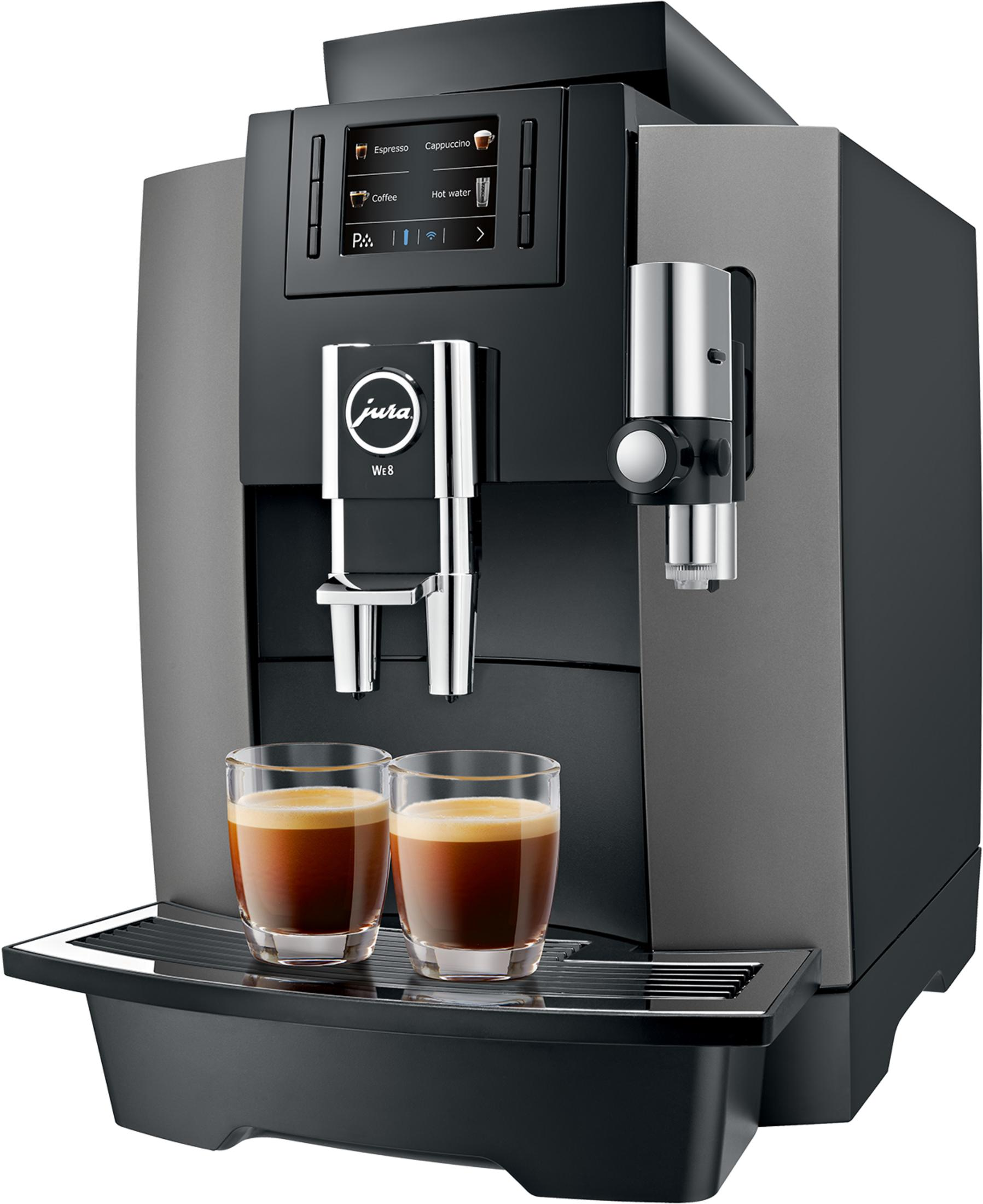 Eine schwarze und graue Kaffeemaschine mit zwei Gläsern Espresso.