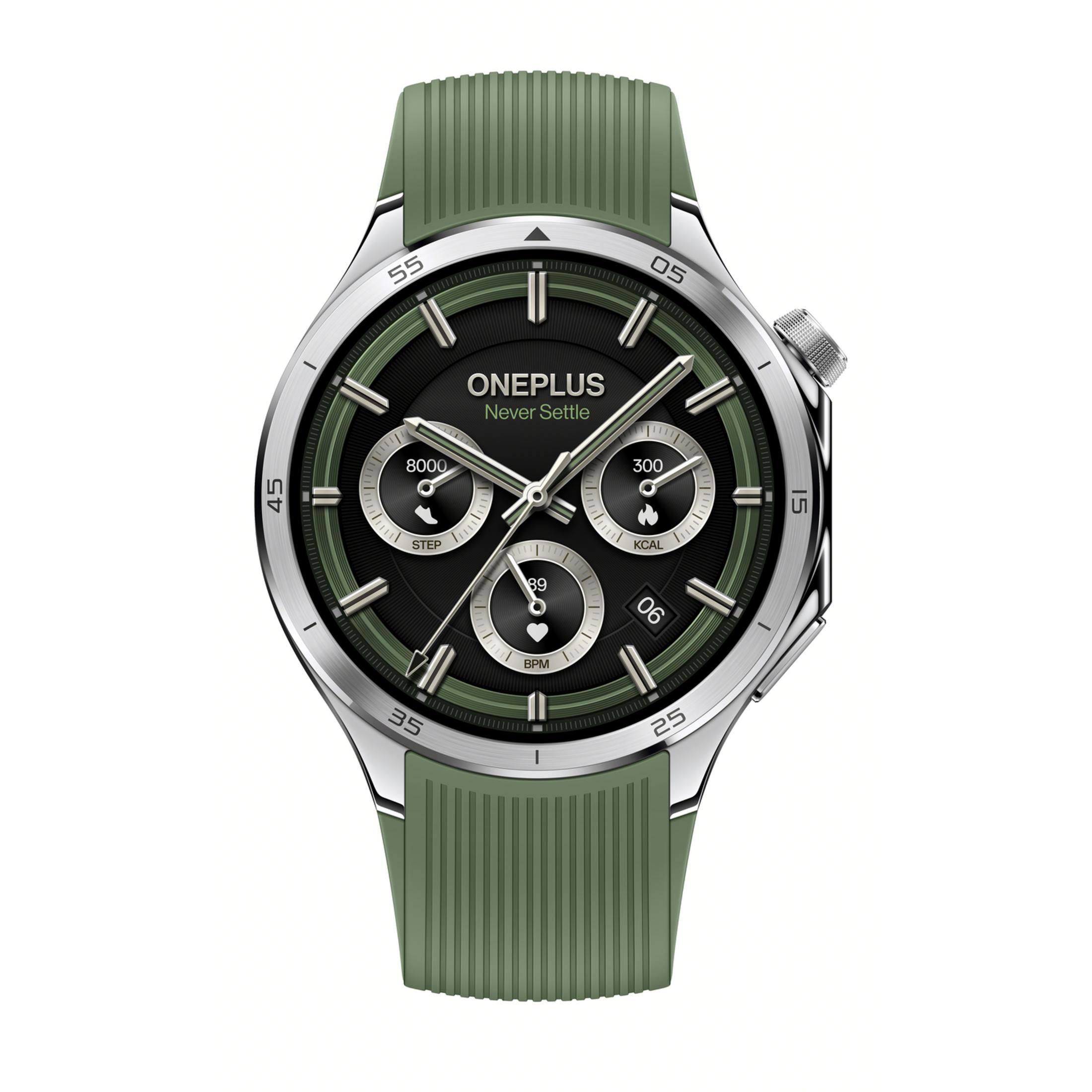 Zielony smartwatch ze srebrną obudową i czarną tarczą. Pokazuje kroki, kcal, BPM.