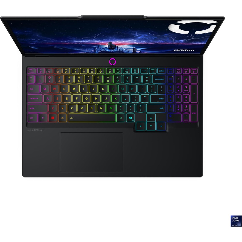Renkli klavyeli ve ekranda fütüristik şehir manzaralı açık dizüstü bilgisayar.