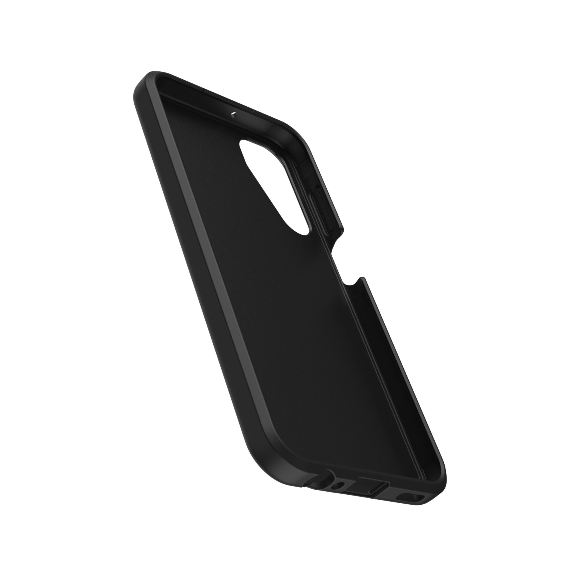 Zwarte plastic telefoonhoes, van de zijkant getoond met uitsparingen voor camera en poorten.