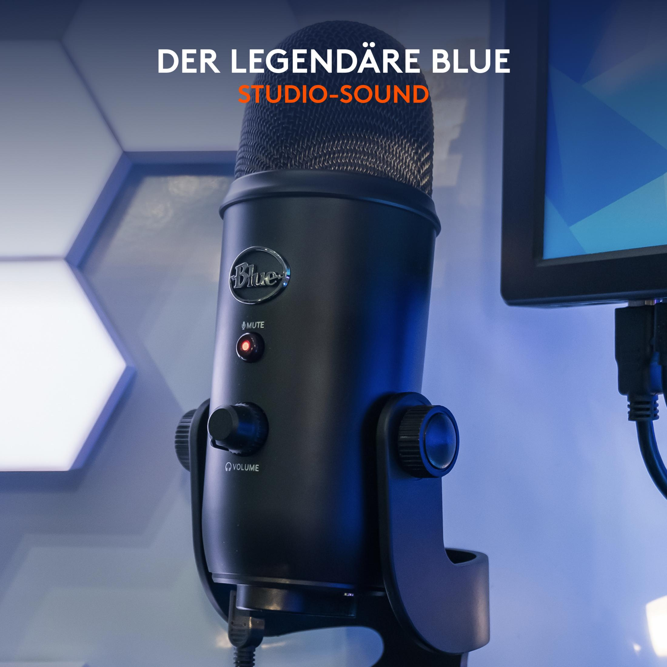 Ein schwarzes Blue Yeti Mikrofon mit roter Stummschalttaste und Lautstärkeregler.