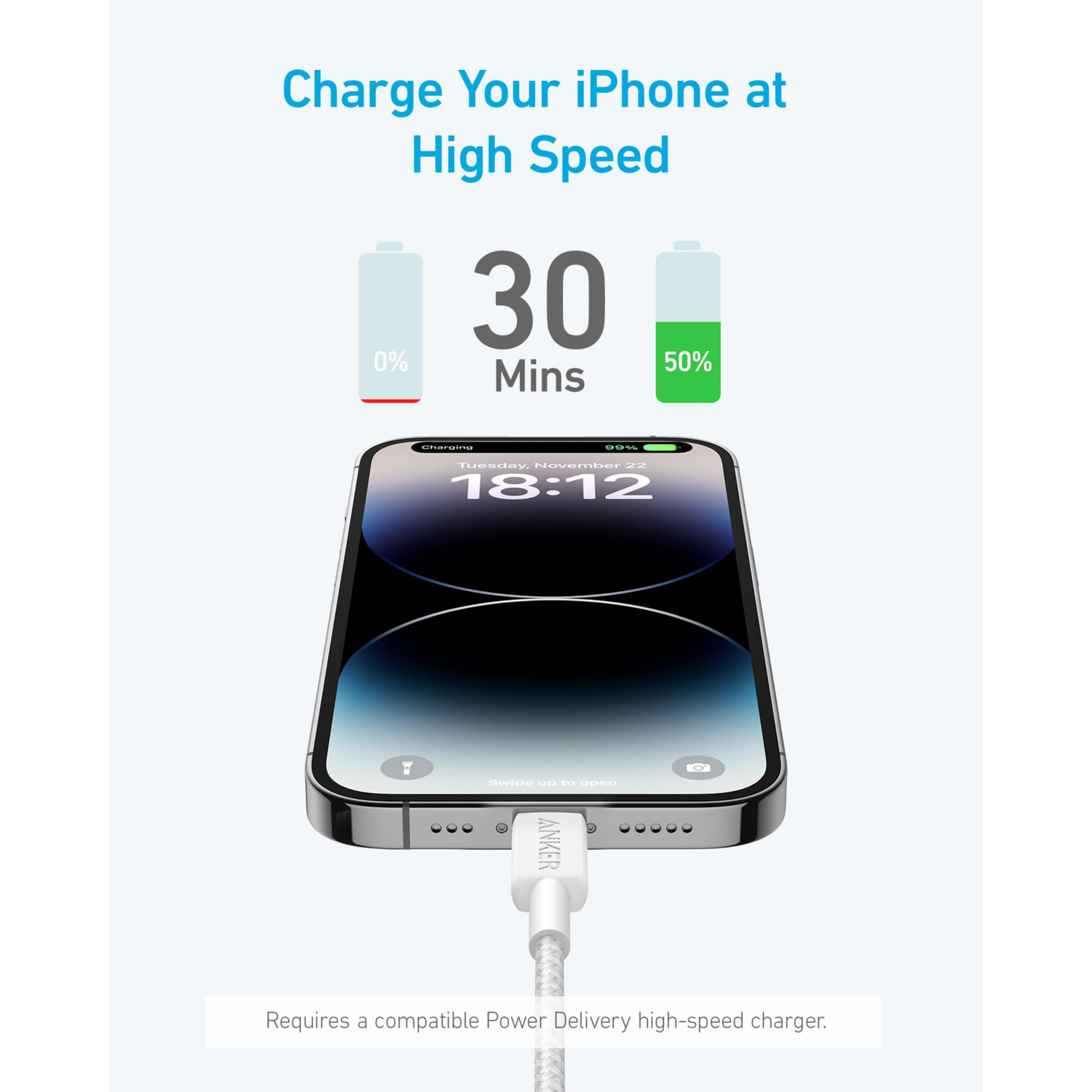 Un iPhone se está cargando rápidamente con un cable blanco de Anker.