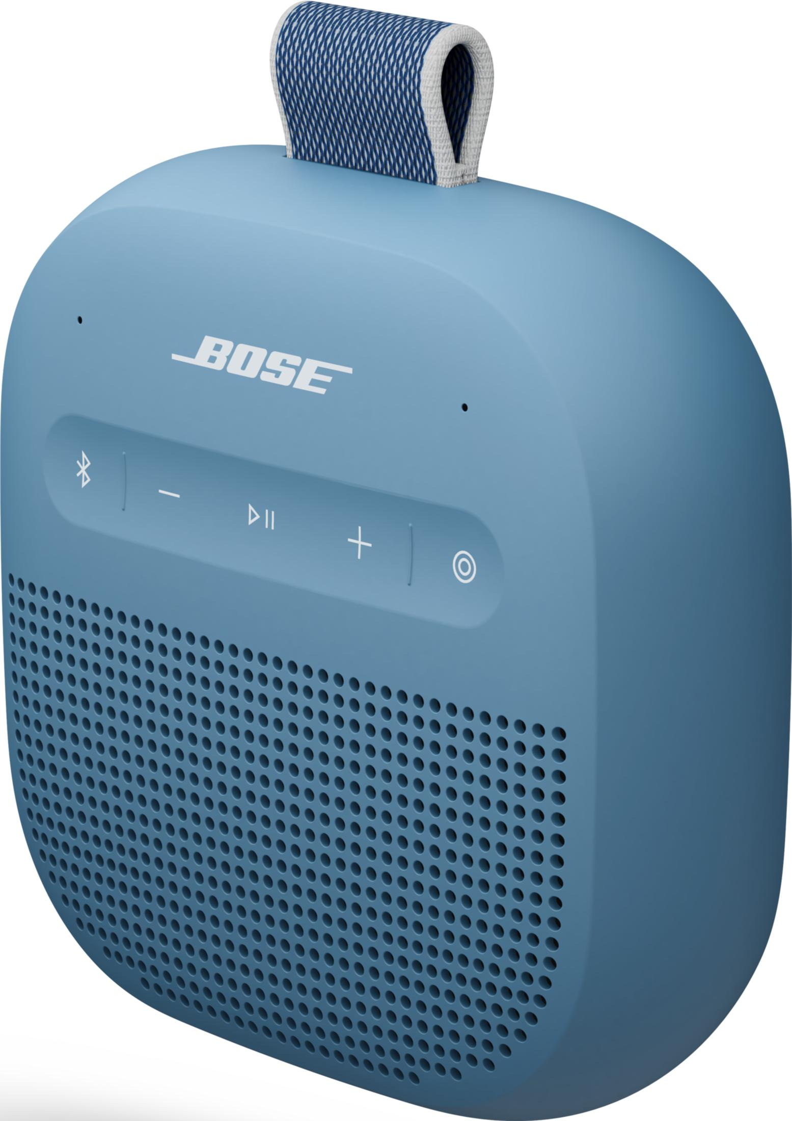 Un altavoz Bose azul con asa y botones de control.