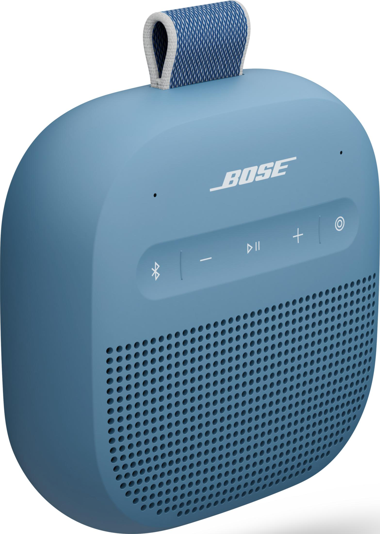 Un altavoz Bose azul con asa de tela en la parte superior y botones.