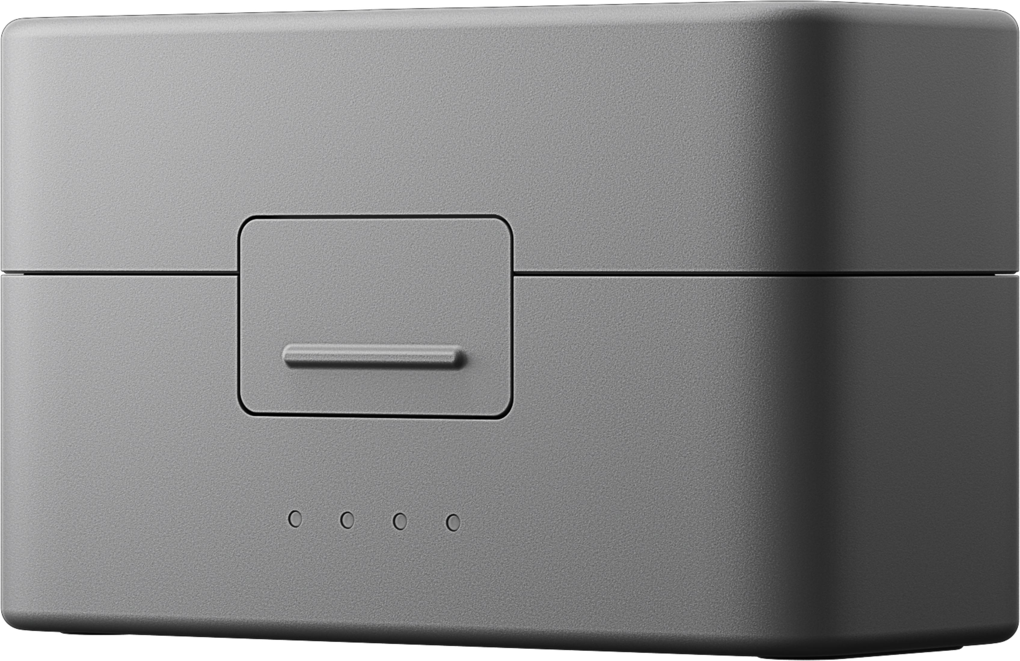 Una caja gris con una solapa y cuatro luces indicadoras.