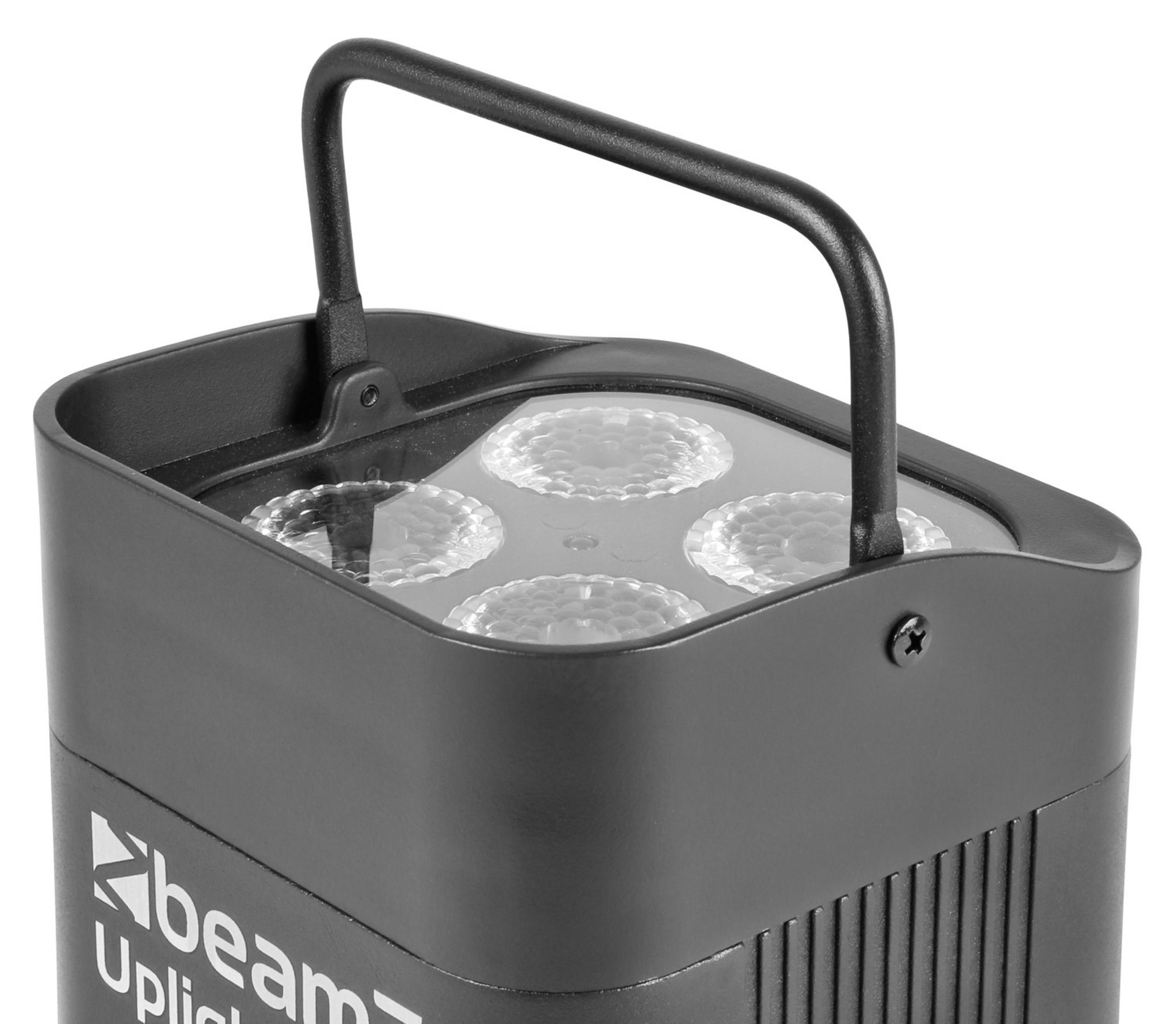 Luz ascendente negra con asa y cuatro lentes redondas encima.