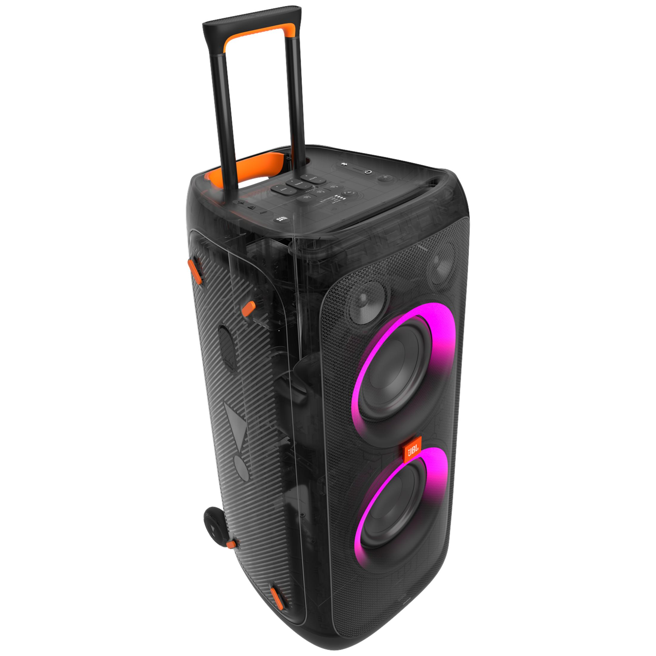 Altavoz de fiesta JBL negro con asa retráctil, ruedas y anillos luminosos rosas.