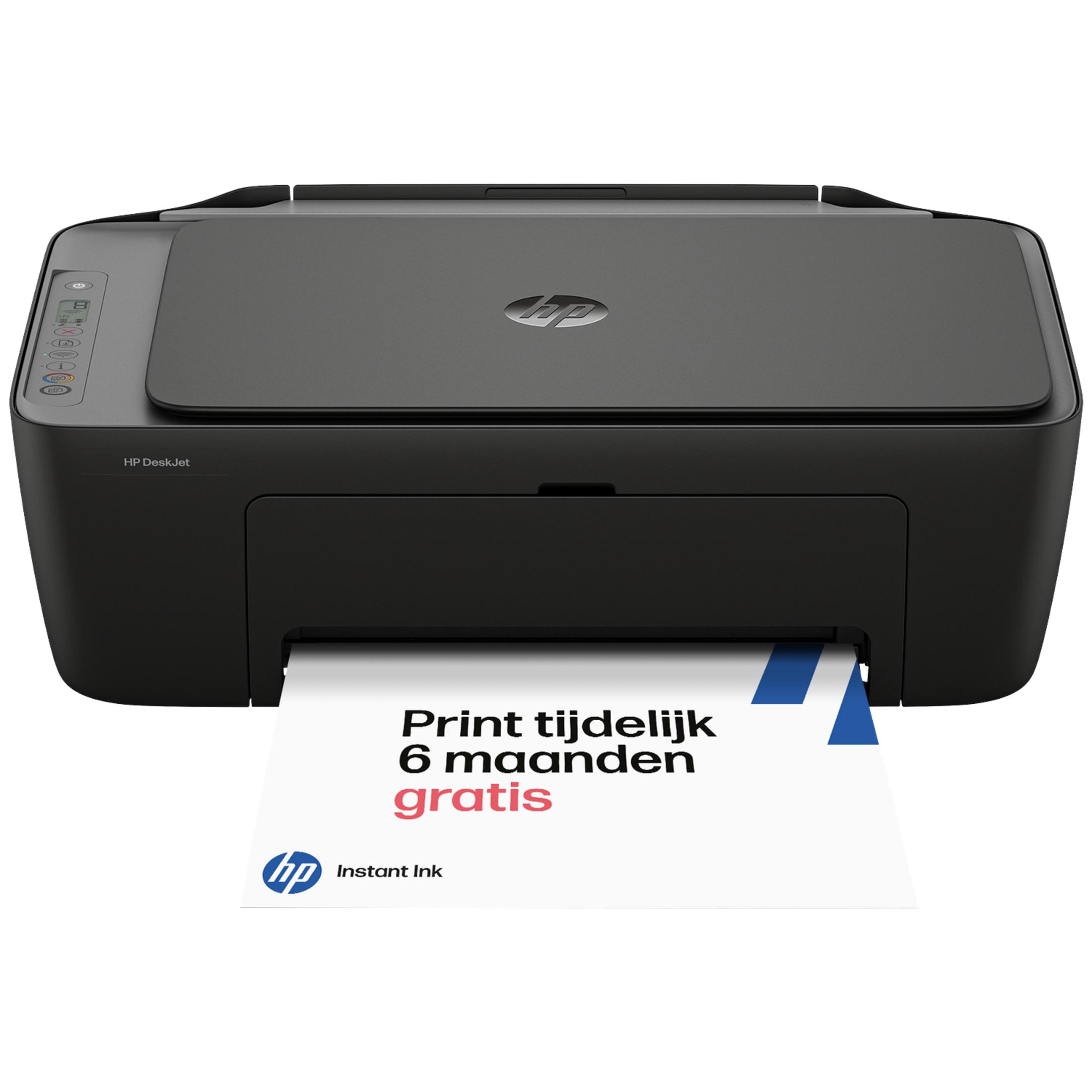 Zwarte HP DeskJet printer met een geprint vel dat 6 maanden gratis printen adverteert.