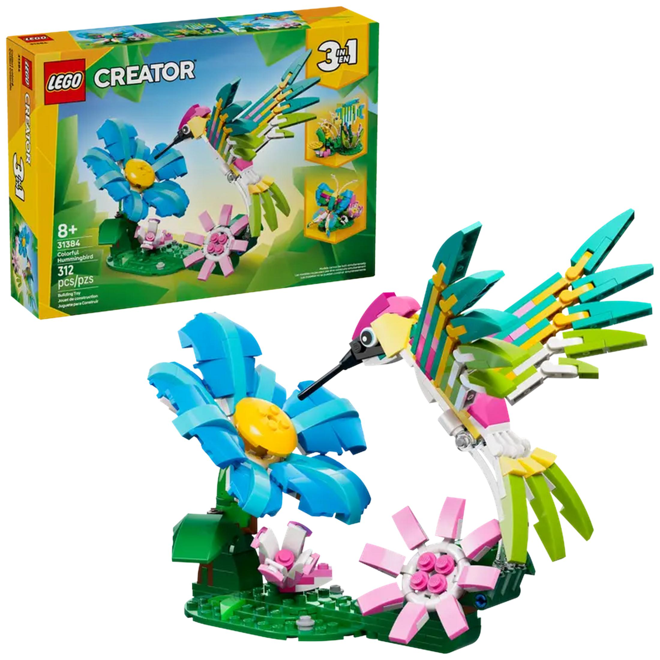 Kolorowy LEGO koliber z kwiatami i motylem na pudełku.