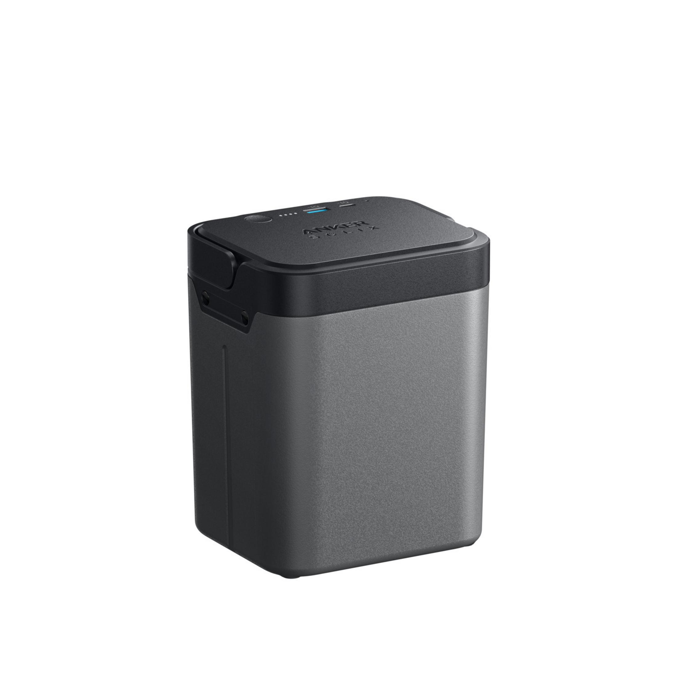 Szary powerbank Anker z czarną pokrywą i wskaźnikiem naładowania.