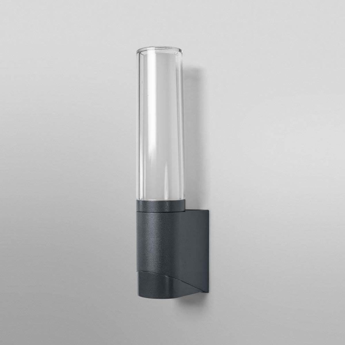Dunkelgraue Wandleuchte mit zylindrischem Glas.