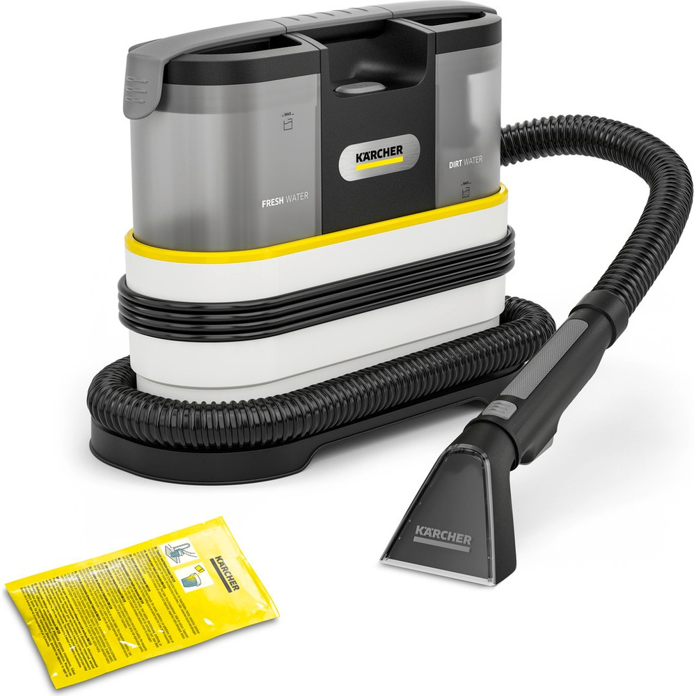 Pulitore tappeti Karcher con serbatoi acqua pulita/sporca, tubo, ugello e soluzione pulente.