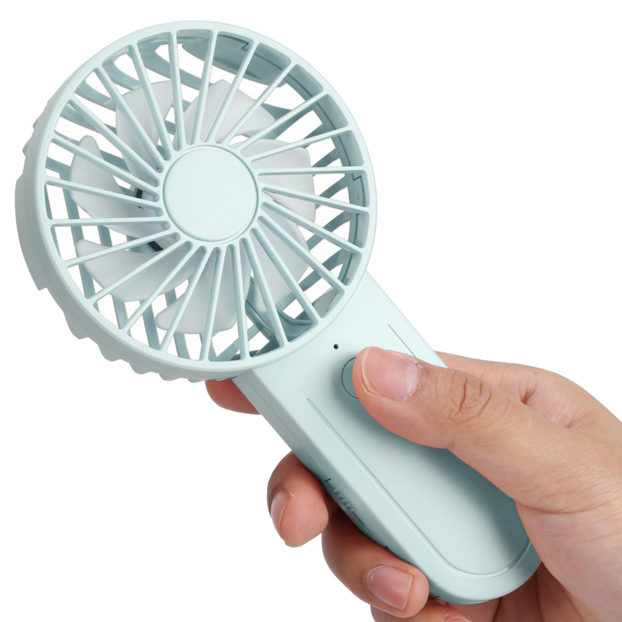Helles hellgrünes Handventilator mit zwei Rotorblättern, von einer Hand gehalten.