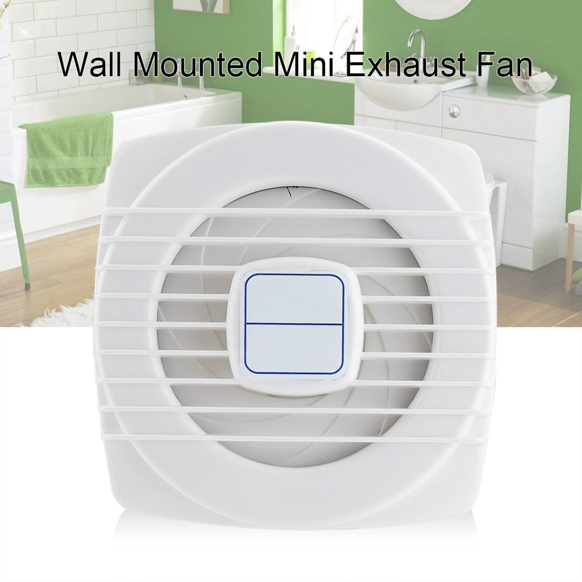 Ein wei'er Mini-Wandventilator mit Lamellen vor einem Badezimmer-Möbel.