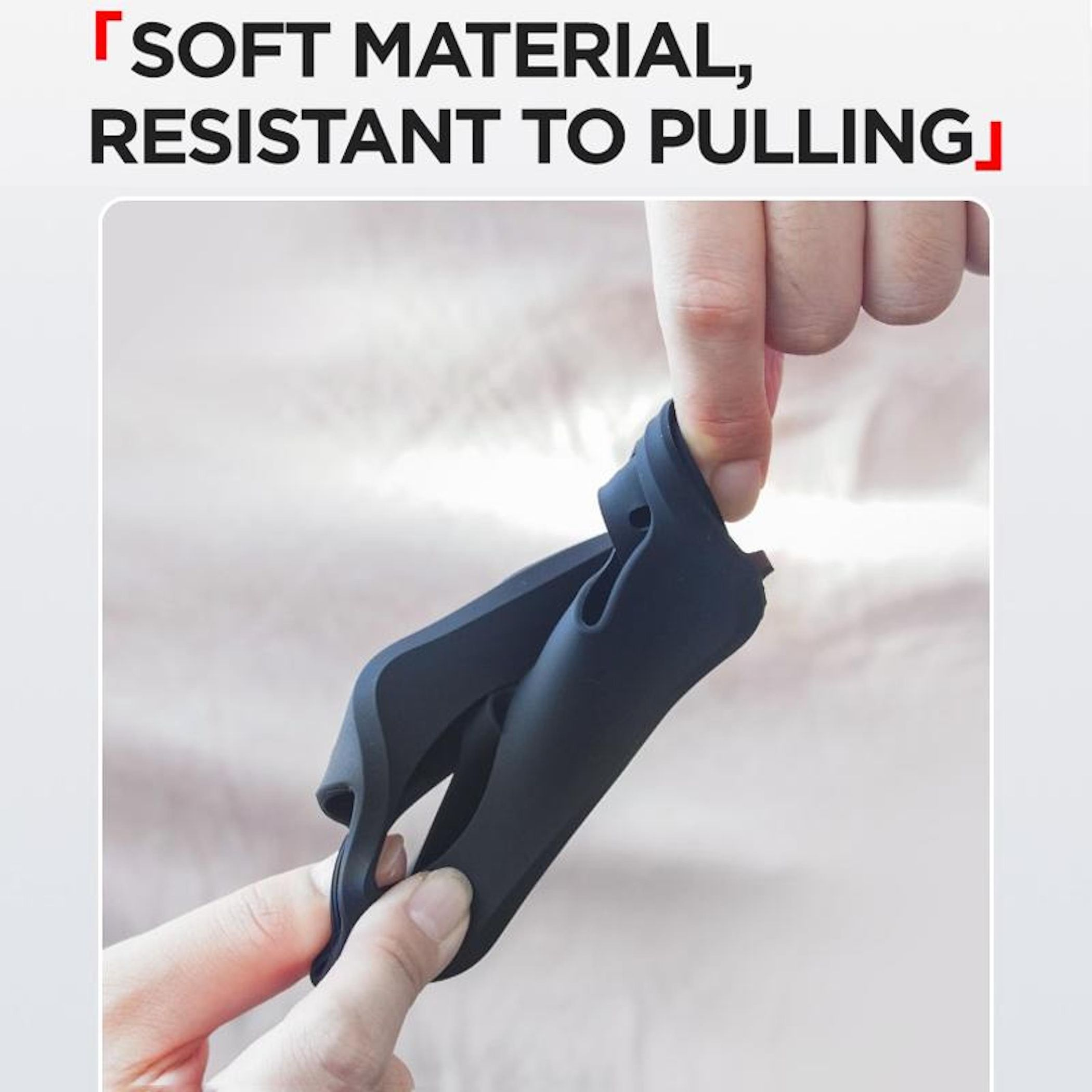 Hände biegen ein schwarzes, flexibles Material. Der Text lautet: Weiches Material, widerstandsfähig.