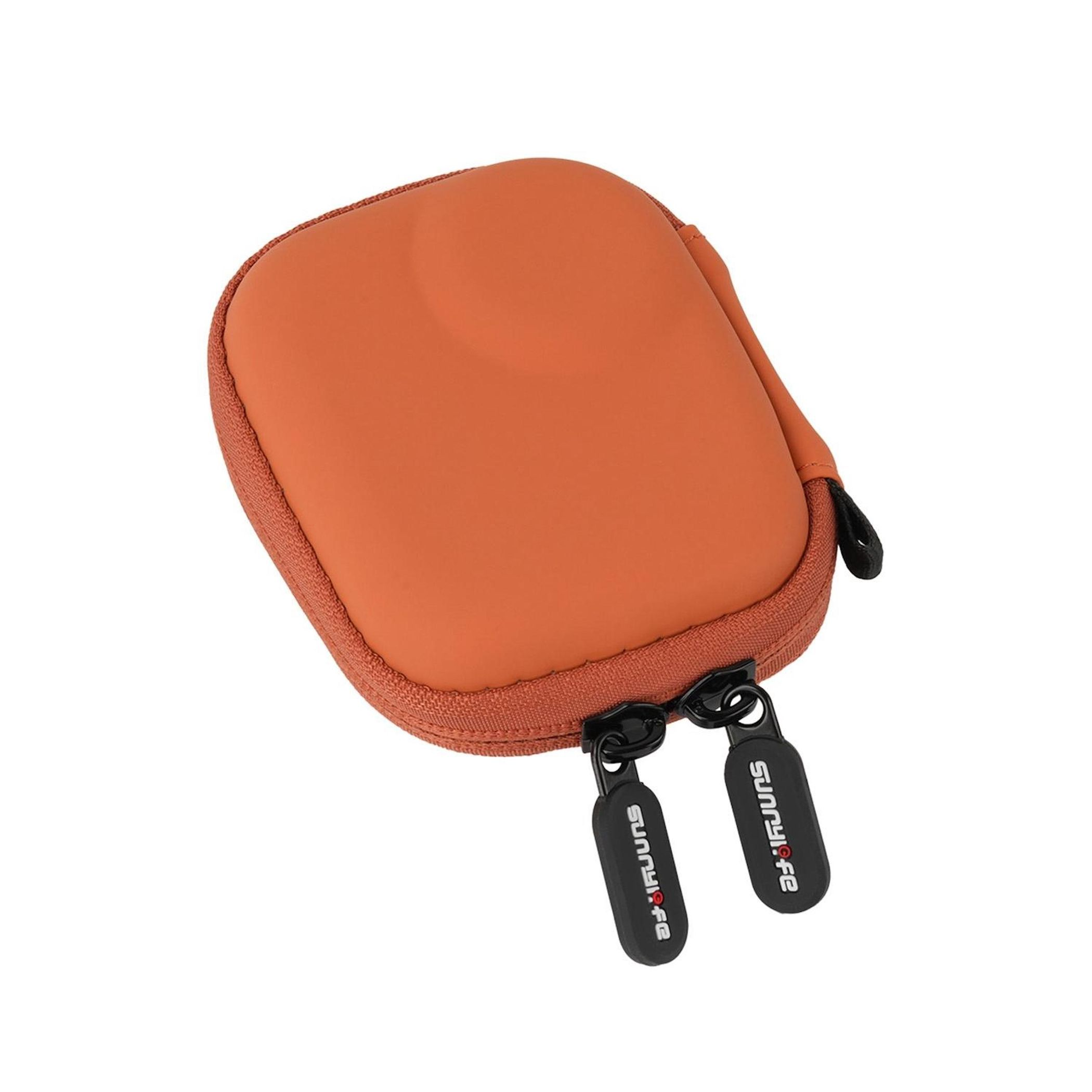 Ein orangefarbener Reißverschlussetui mit schwarzem Reißverschluss und Anhänger.
