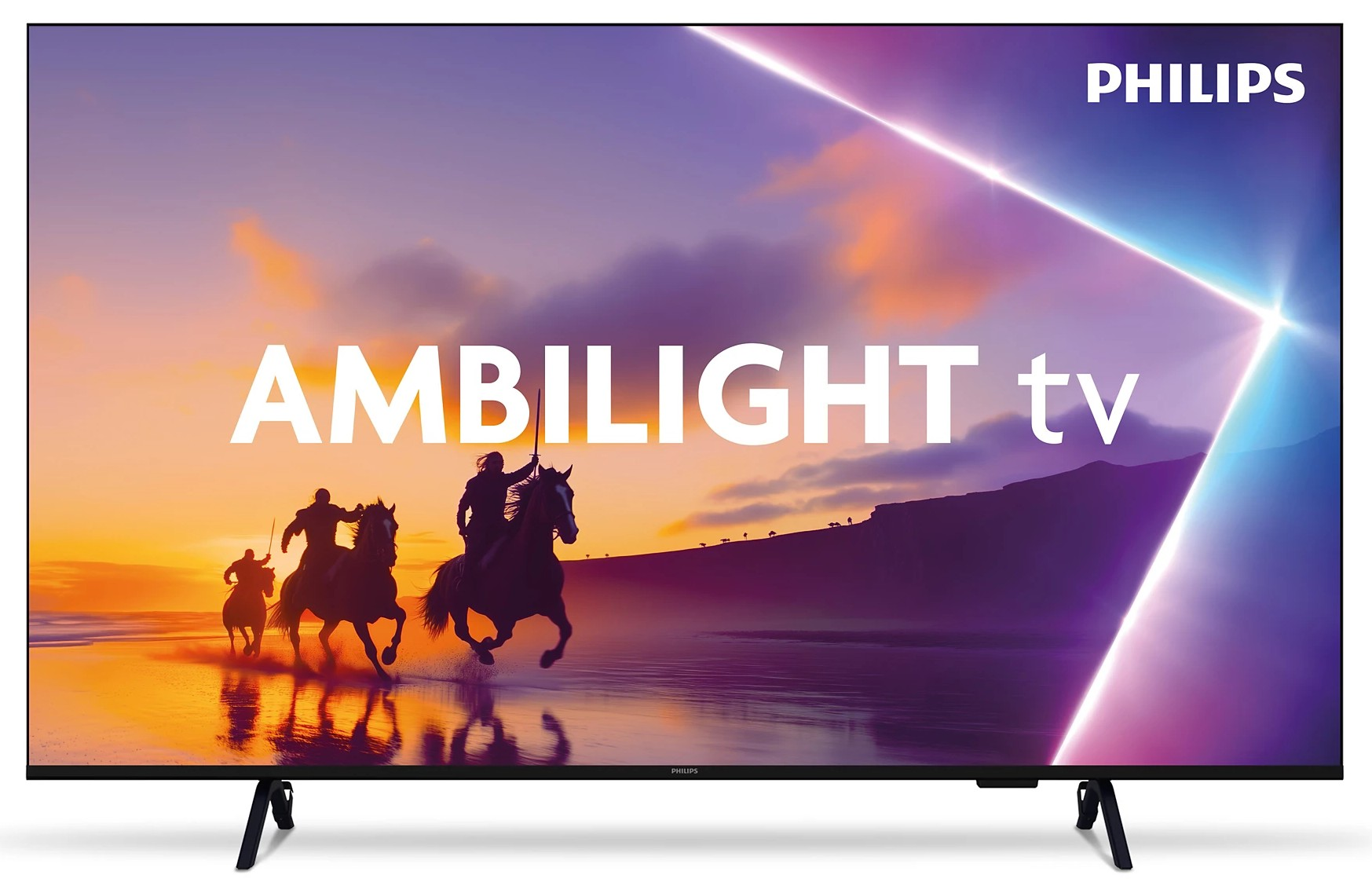 Telewizor Philips Ambilight wyświetla jeźdźców na koniach na plaży o zachodzie słońca.
