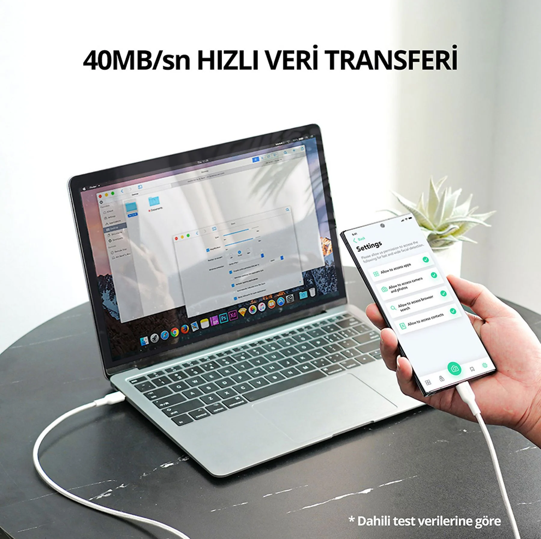 Bir laptop ve akıllı telefon kabloyla bağlı. Metin: 40MB/sn HIZLI VERİ TRANSFERİ.