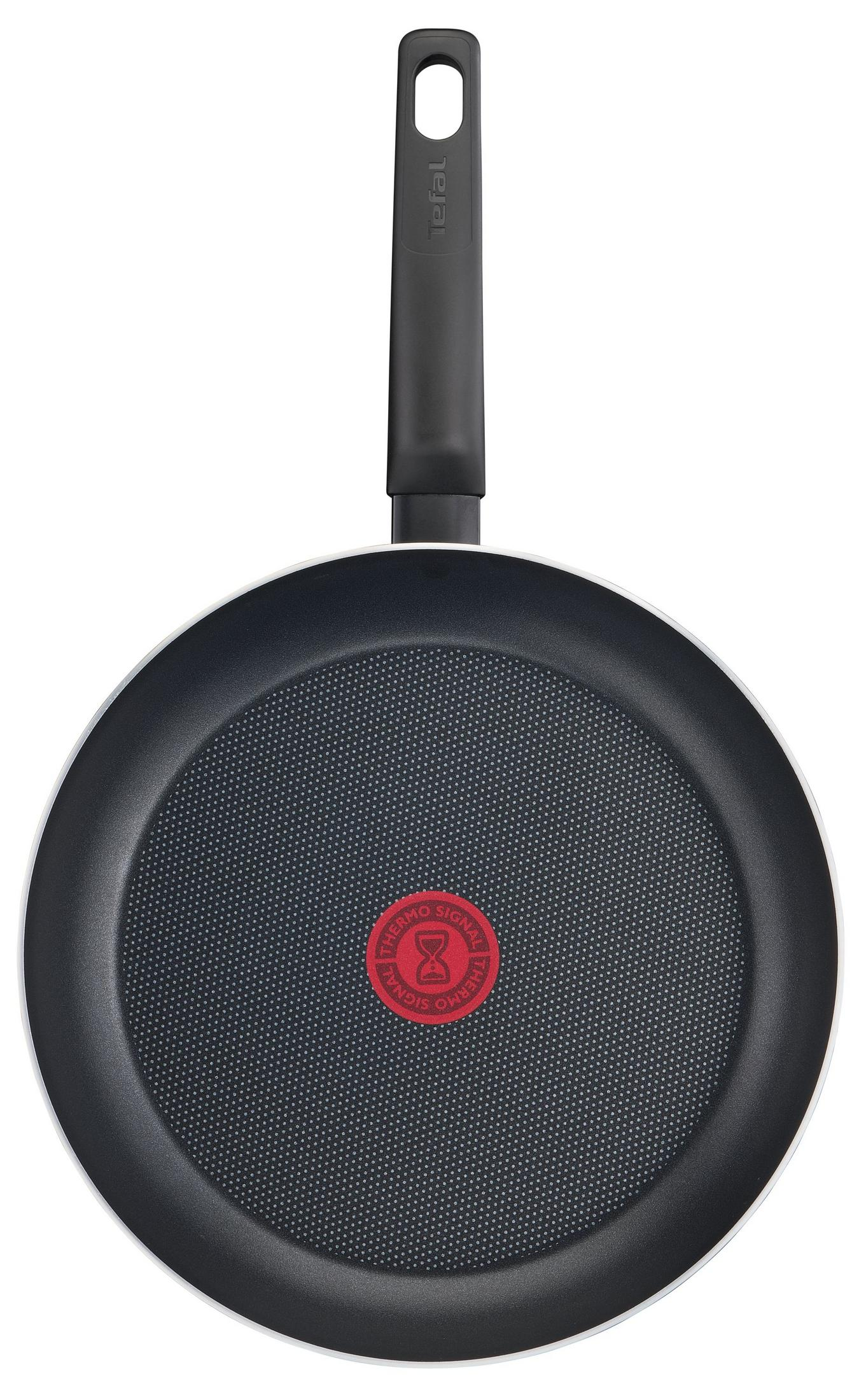 Black frying pan with red Thermo-Signal and black handle.