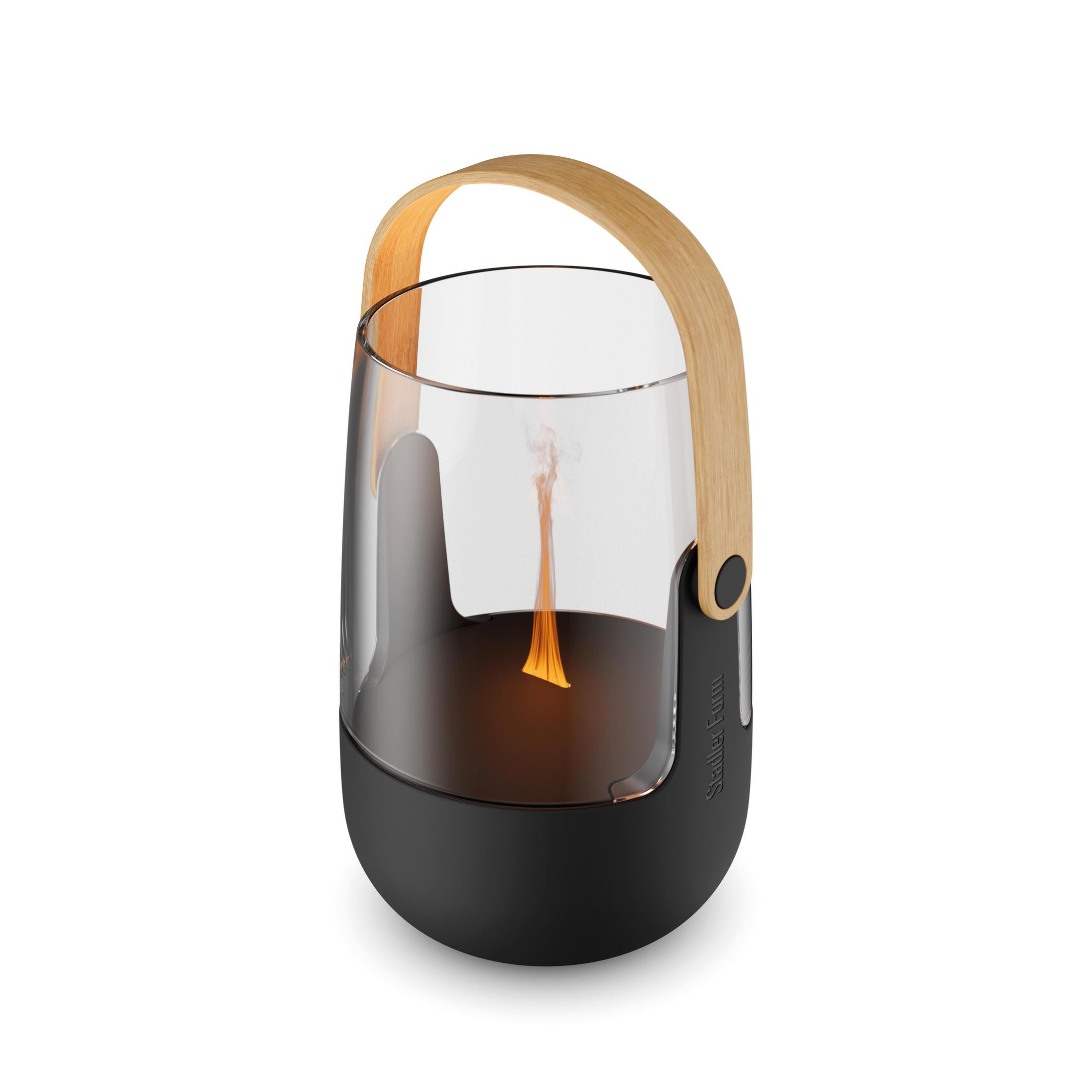 Black lantern with glass cylinder and wood handle, flame burning inside.
